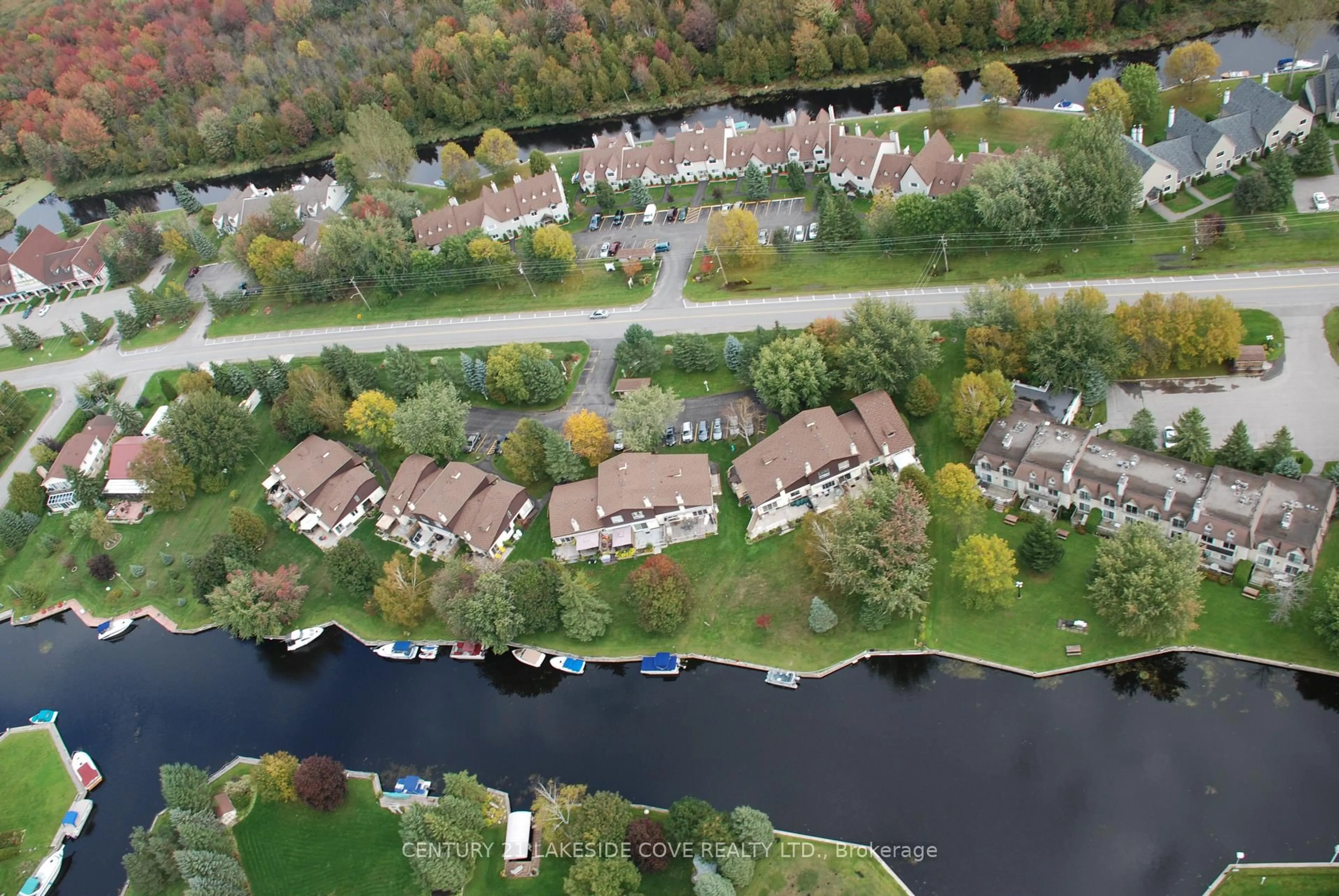 A pic from outside/outdoor area/front of a property/back of a property/a pic from drone, water/lake/river/ocean view for 71 Laguna Pkwy, Ramara Ontario L0K 1B0