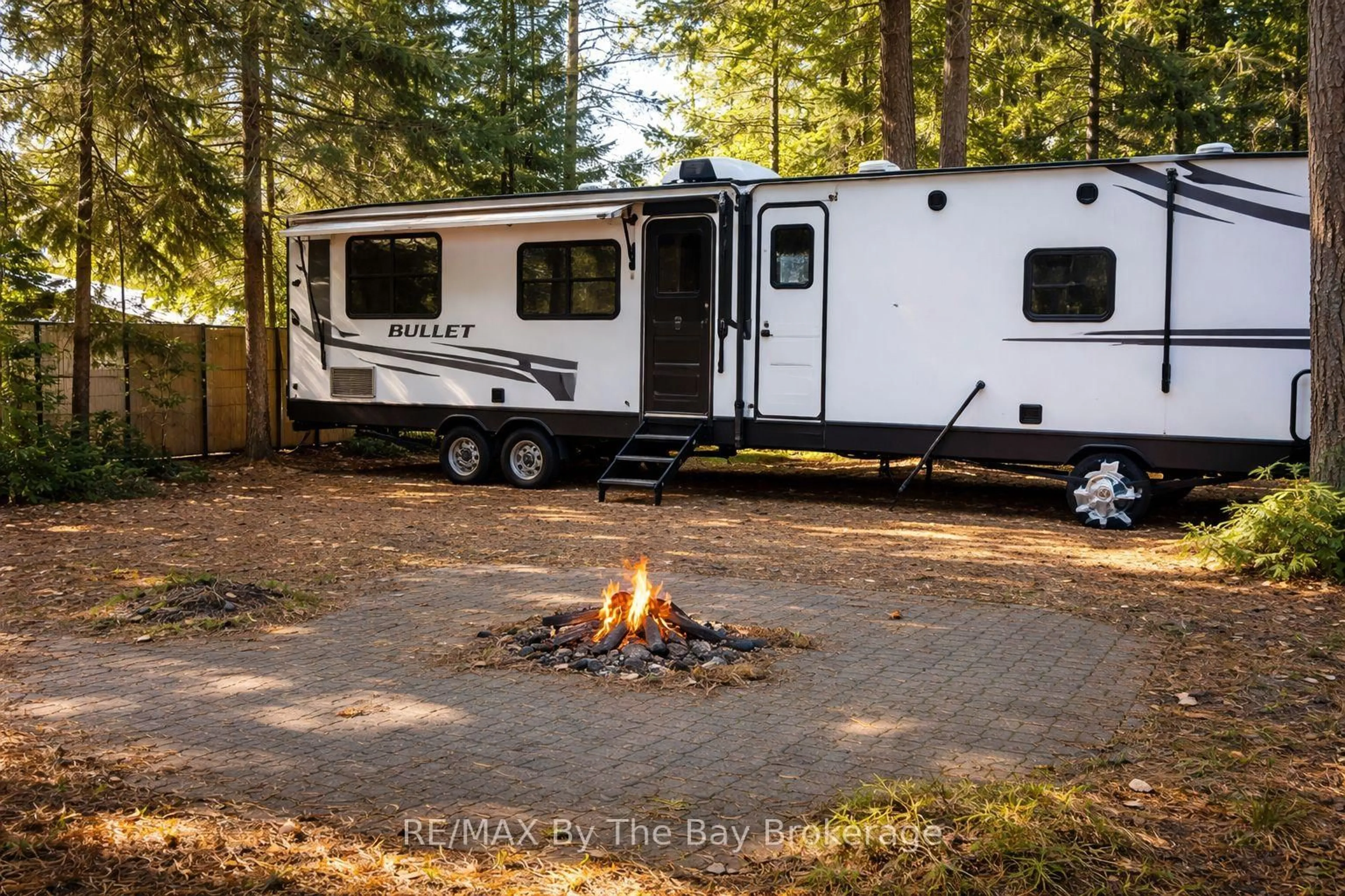 Patio, forest/trees view for 85 Theme Park Dr #133, Wasaga Beach Ontario L9Z 1X7