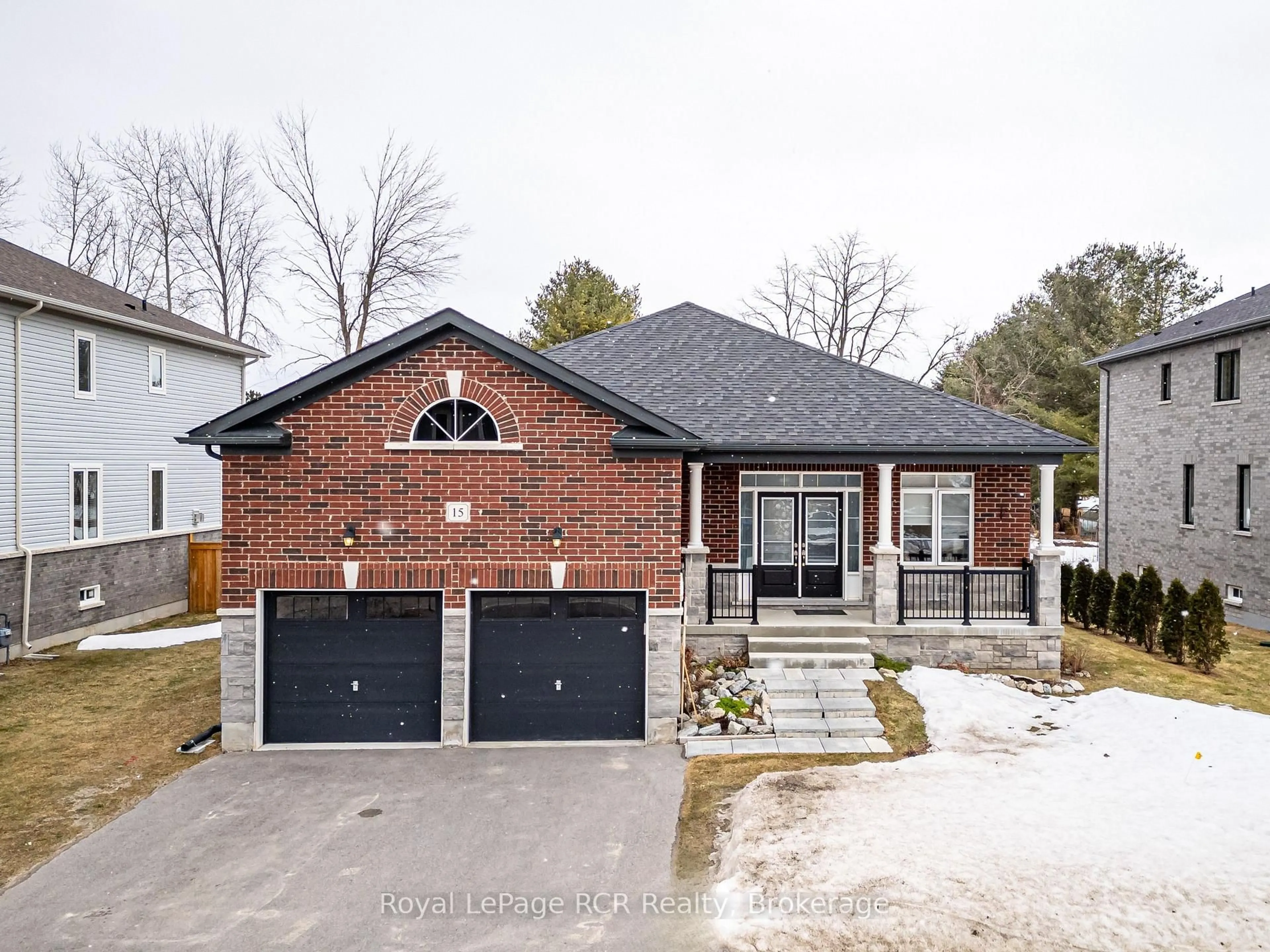 Home with brick exterior material, street for 15 Emerald St, Wasaga Beach Ontario L9Z 0K8