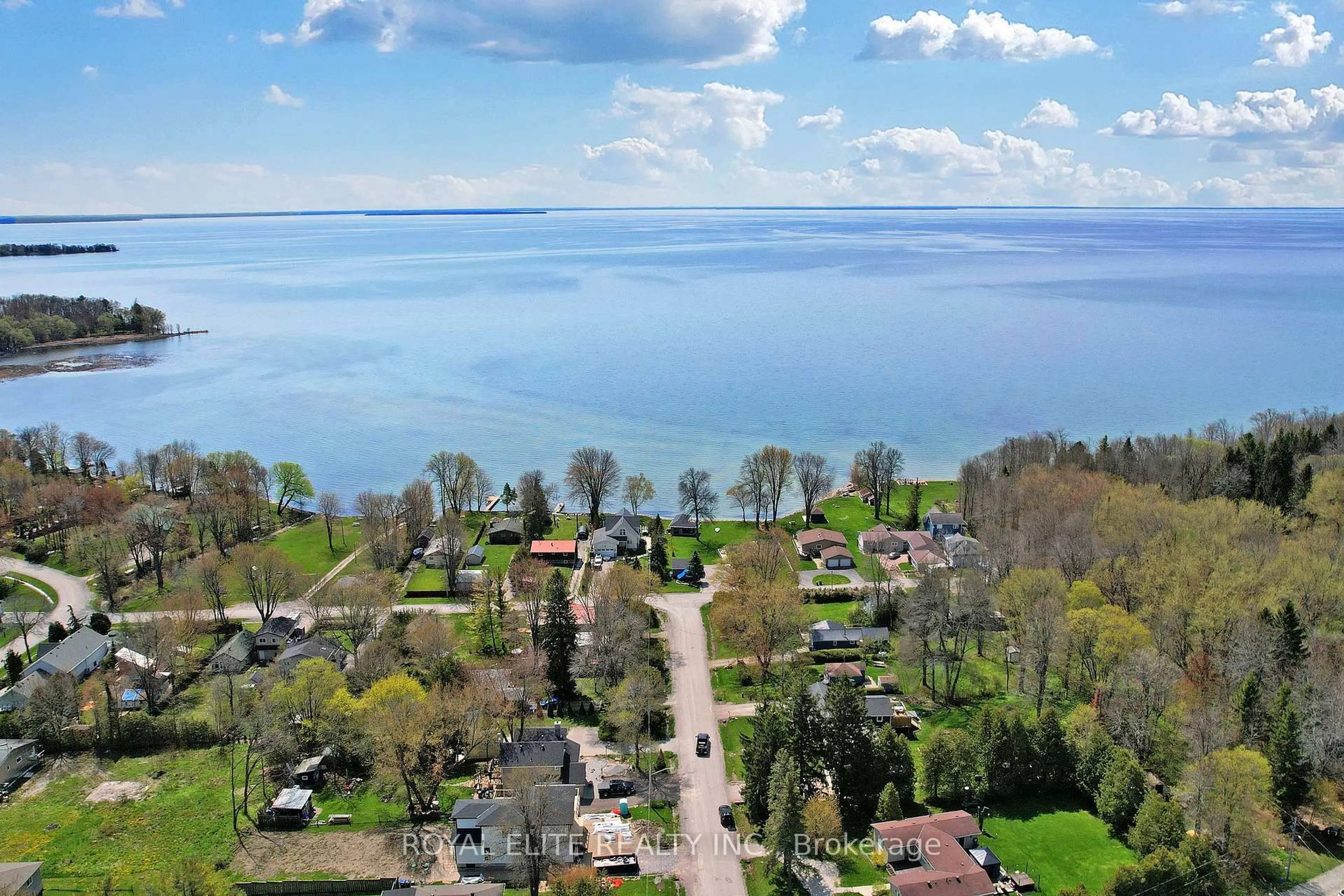 A pic from outside/outdoor area/front of a property/back of a property/a pic from drone, water/lake/river/ocean view for 3965 Hilltop Rd, Ramara Ontario L3V 6H7