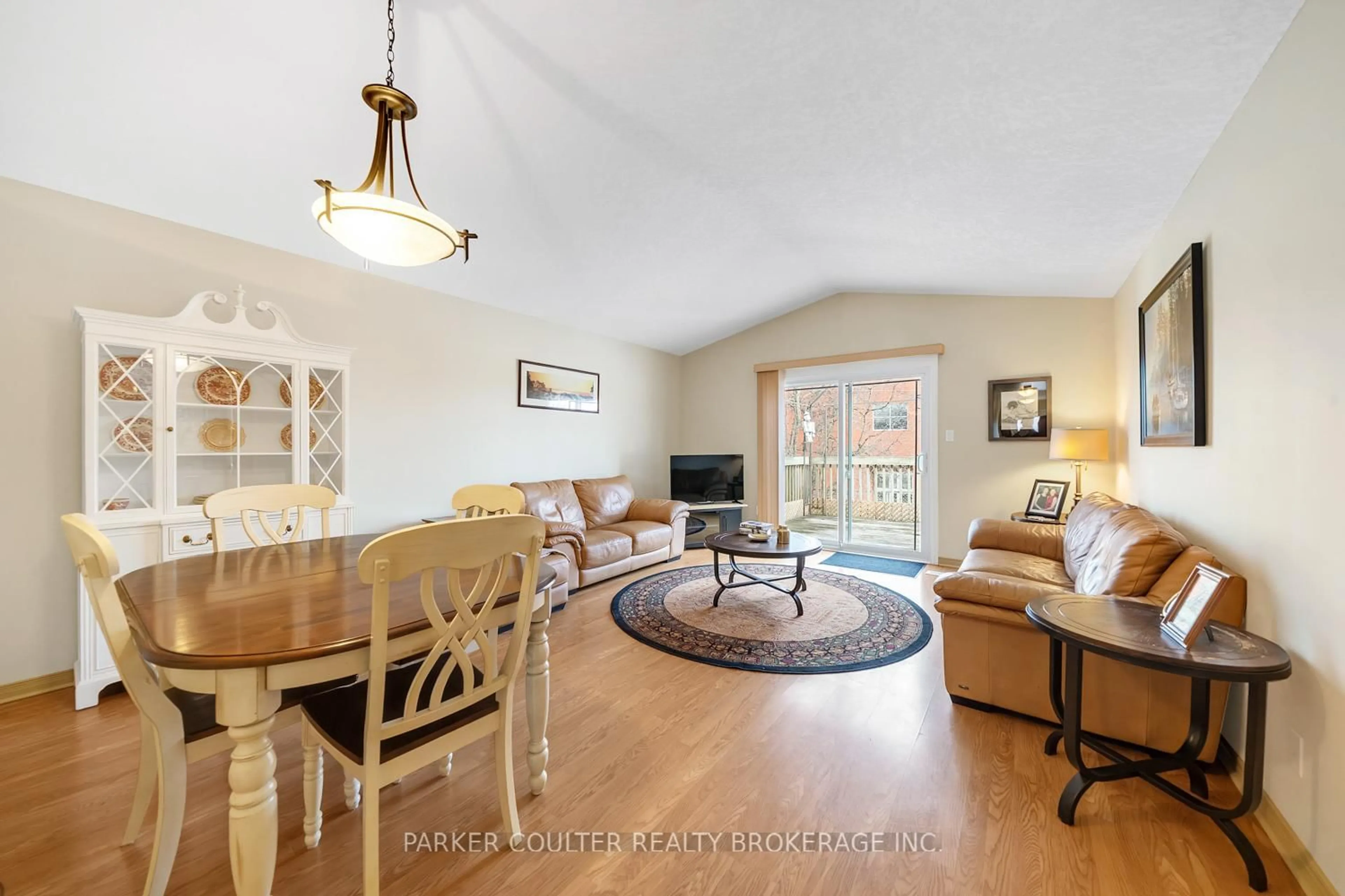 Living room with furniture, wood/laminate floor for 231 Oxford St #15, Orillia Ontario L3V 7S6