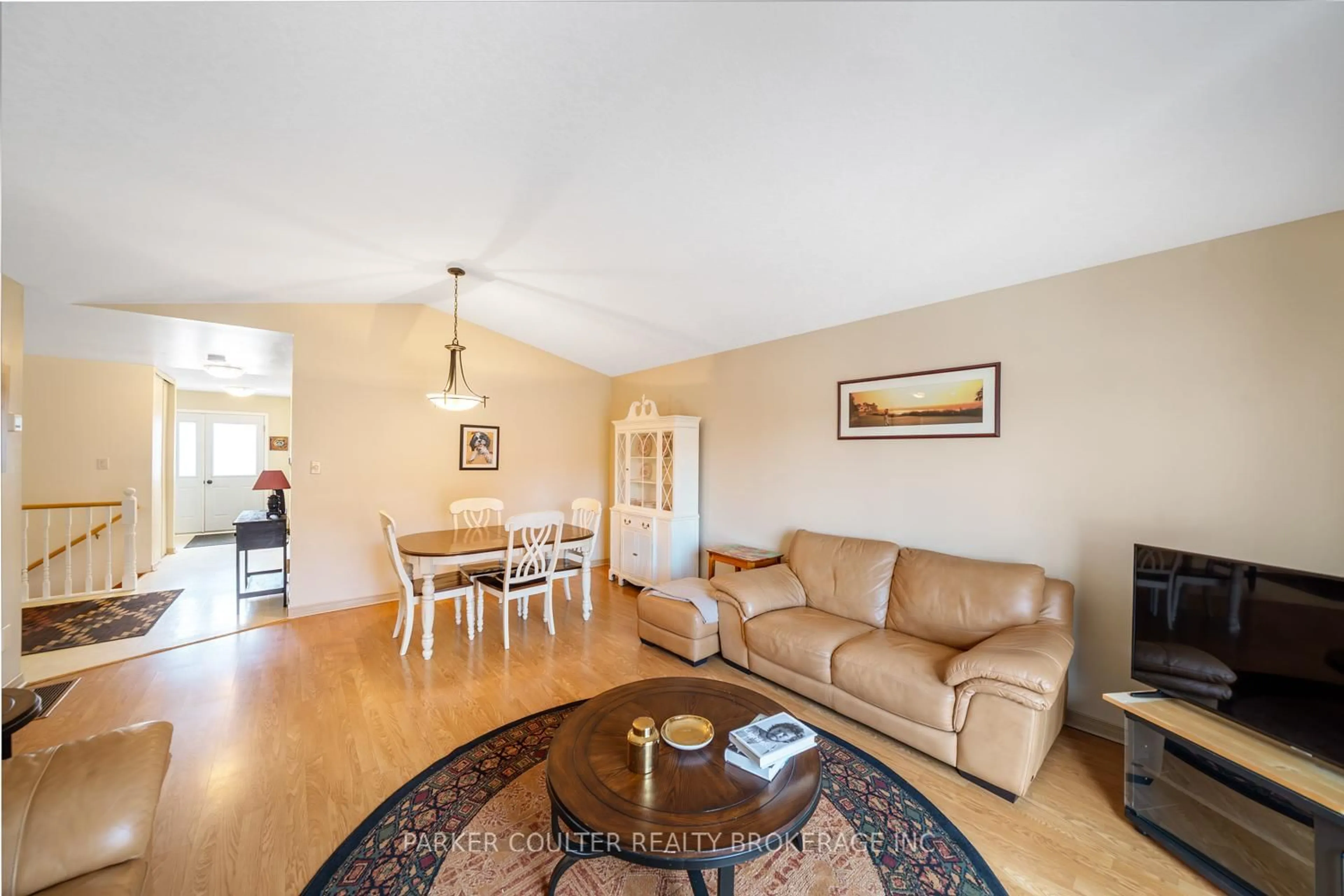 Living room with furniture, wood/laminate floor for 231 Oxford St #15, Orillia Ontario L3V 7S6