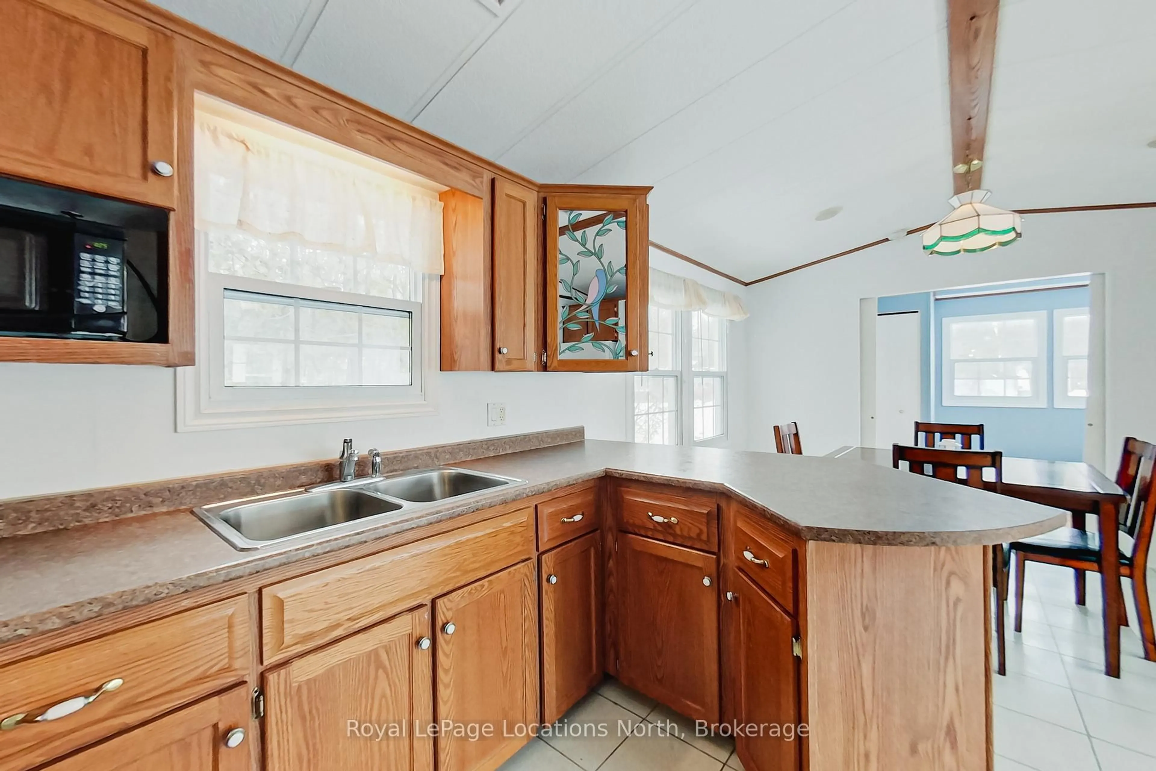 Standard kitchen, ceramic/tile floor for 24 Prince Charles Ave, Springwater Ontario L0L 1P0