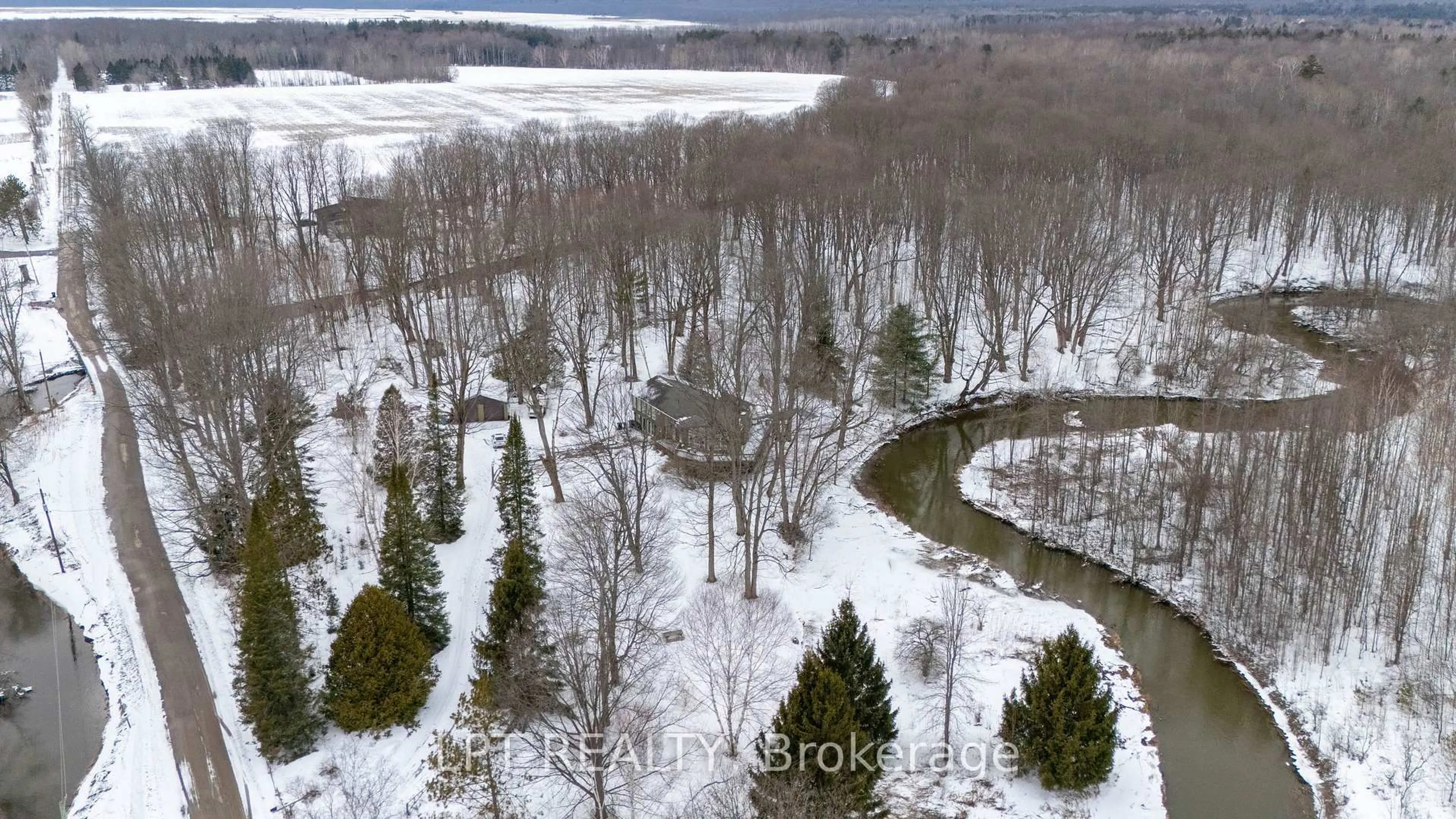 A pic from outside/outdoor area/front of a property/back of a property/a pic from drone, forest/trees view for 50 Concession Rd 2, Tiny Ontario L0L 2T0