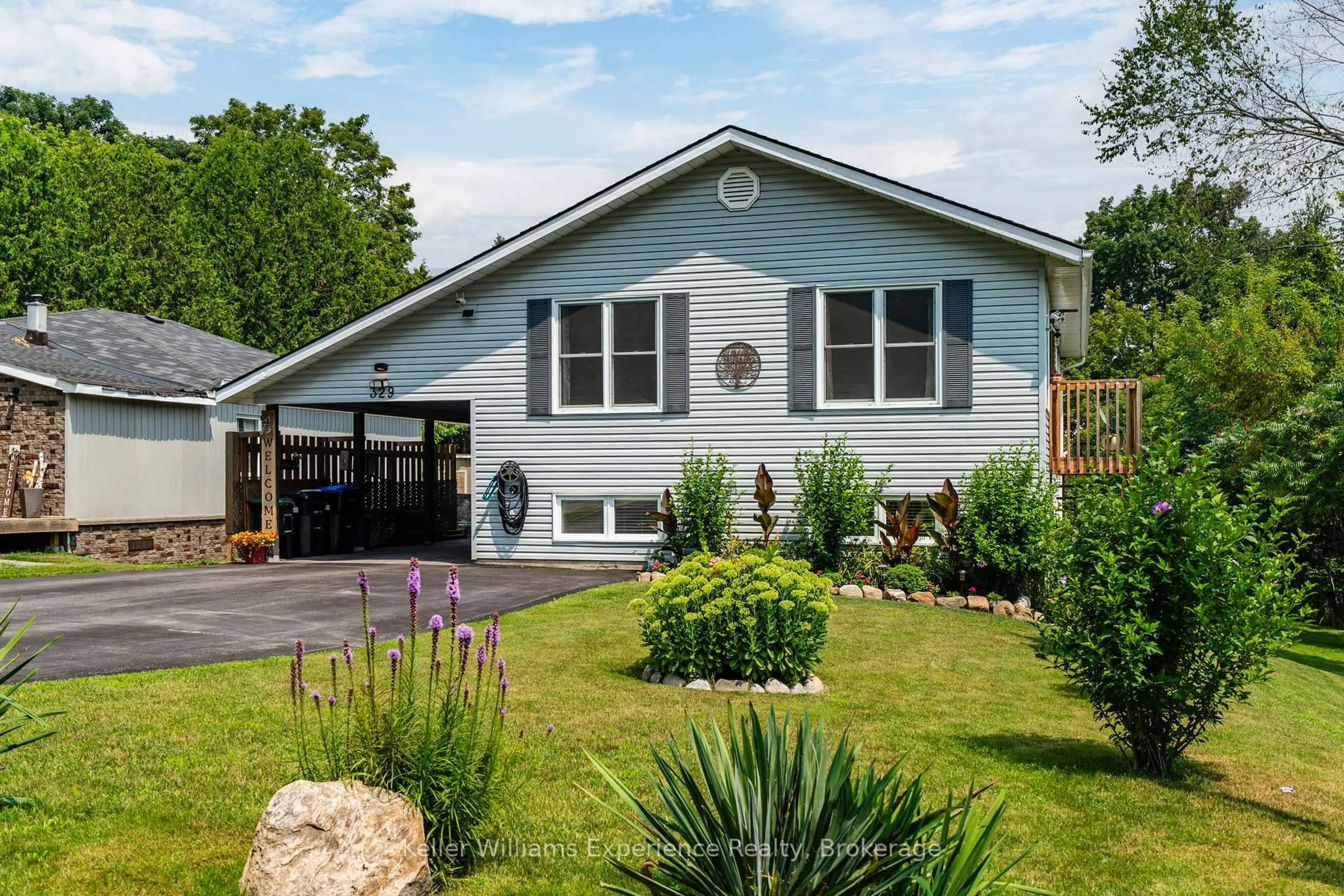 Home with vinyl exterior material, street for 329 & 331 Browns Line, Tay Ontario L0K 2C0