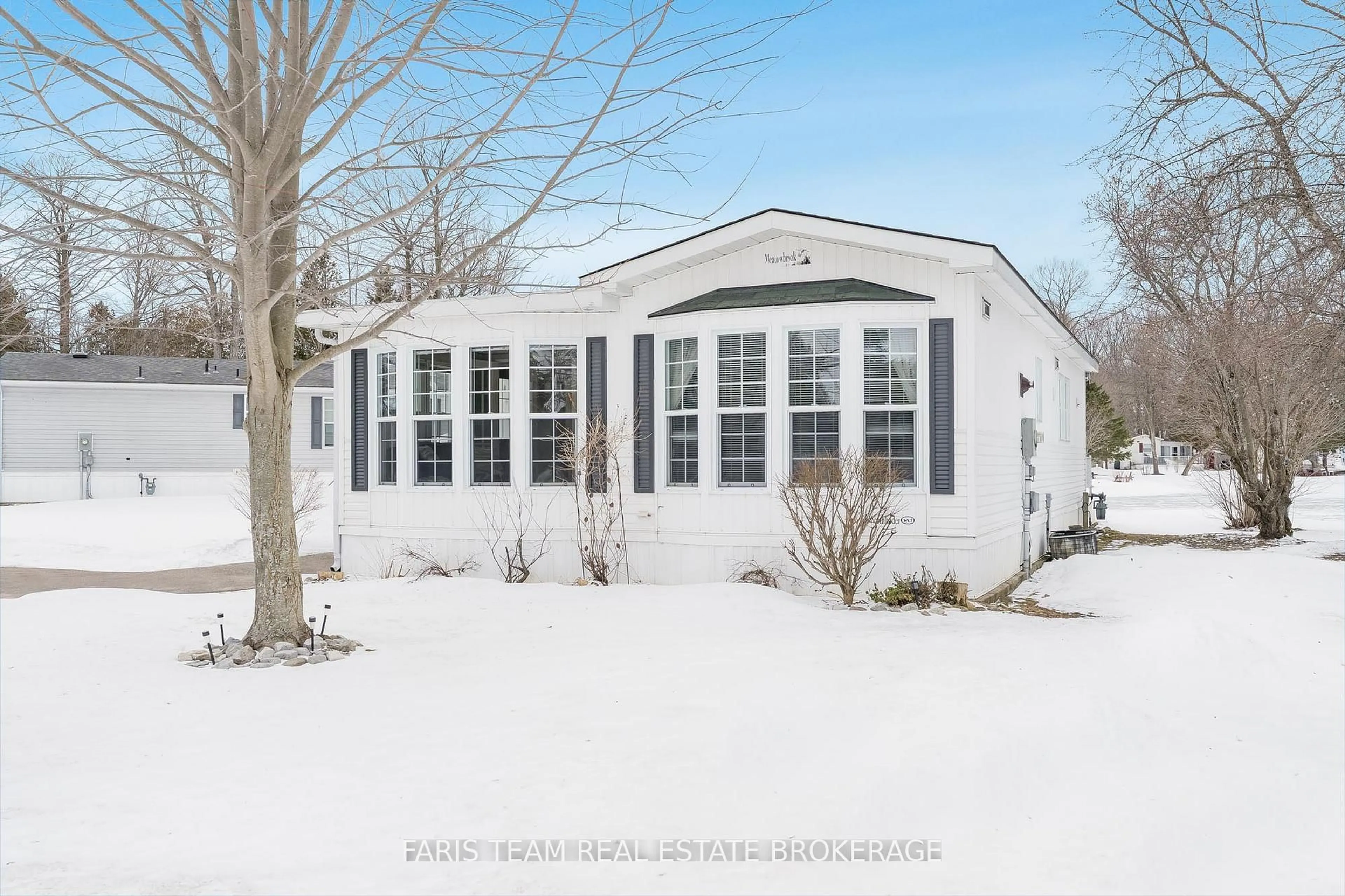 Home with vinyl exterior material, street for 68 The Boardwalk, Wasaga Beach Ontario L9Z 3A8