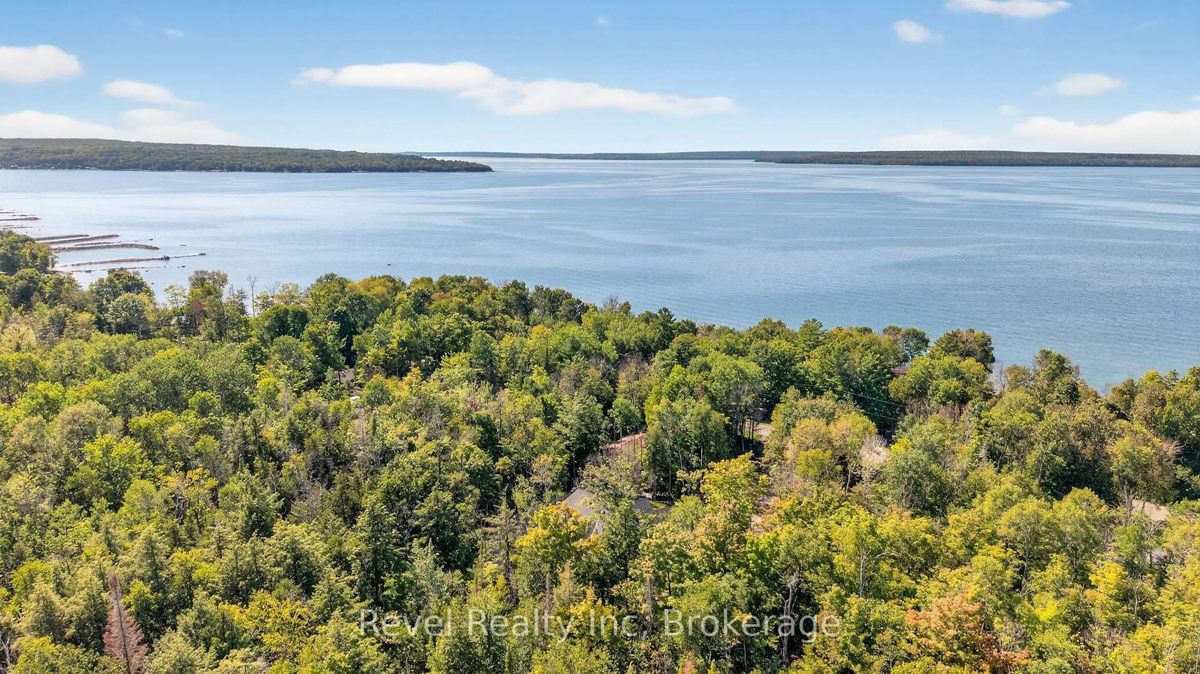 A pic from outside/outdoor area/front of a property/back of a property/a pic from drone, water/lake/river/ocean view for 517 Silverbirch Dr, Tiny Ontario L9M 0M5