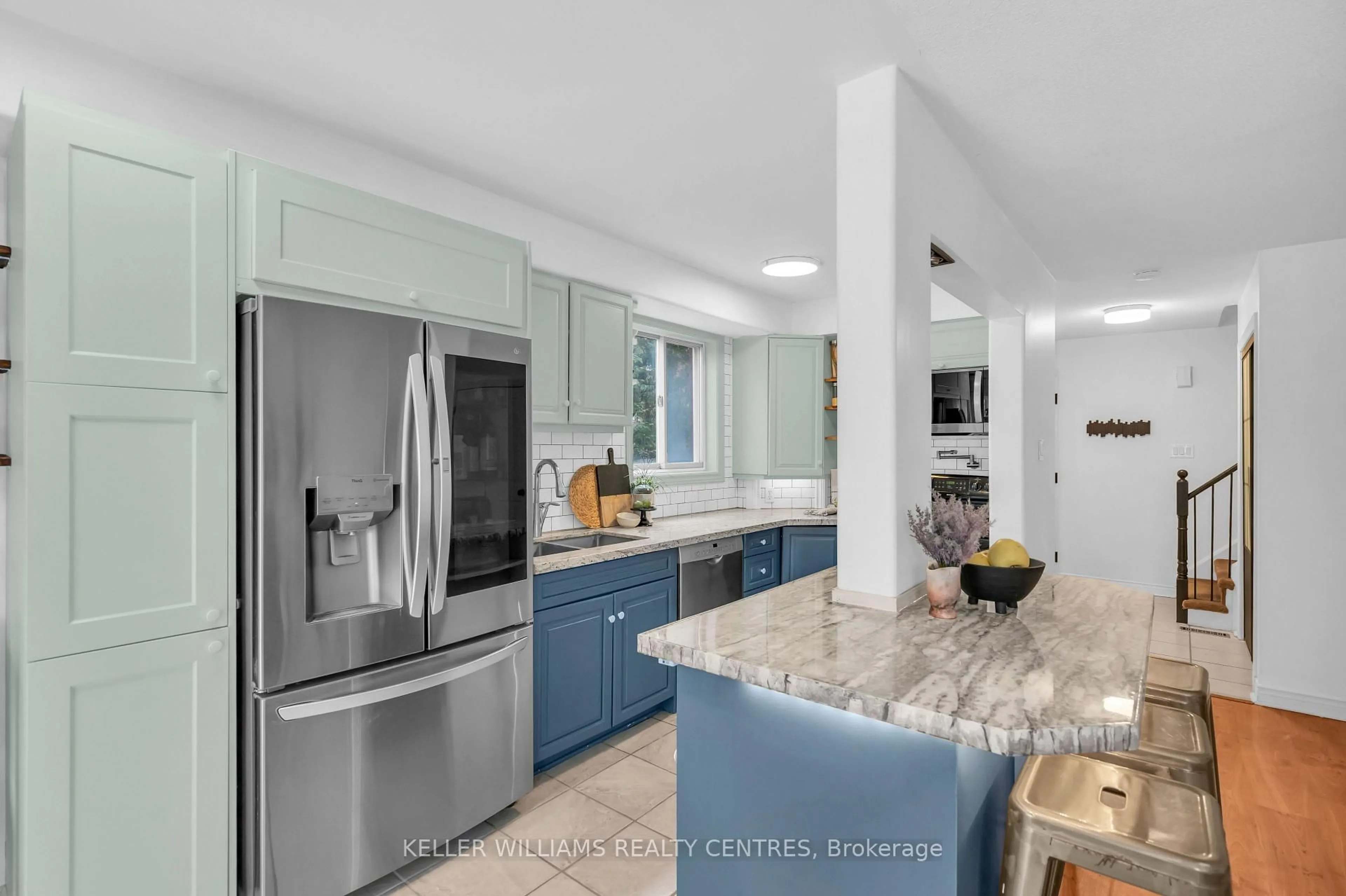 Open concept kitchen, ceramic/tile floor for 163A Owen St, Barrie Ontario L4M 3H8