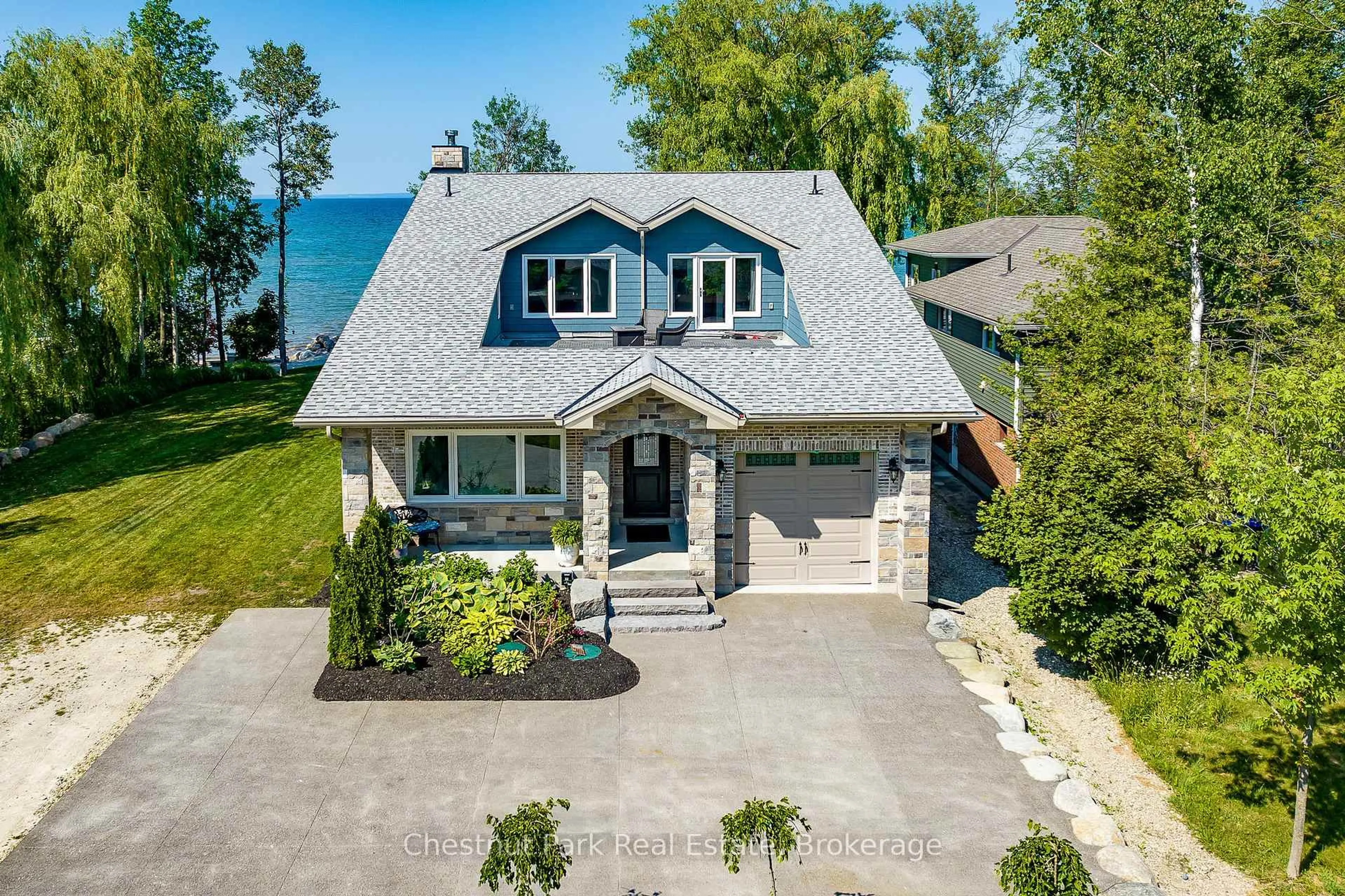 A pic from outside/outdoor area/front of a property/back of a property/a pic from drone, water/lake/river/ocean view for 47 Glen Rd, Collingwood Ontario L9Y 0X2