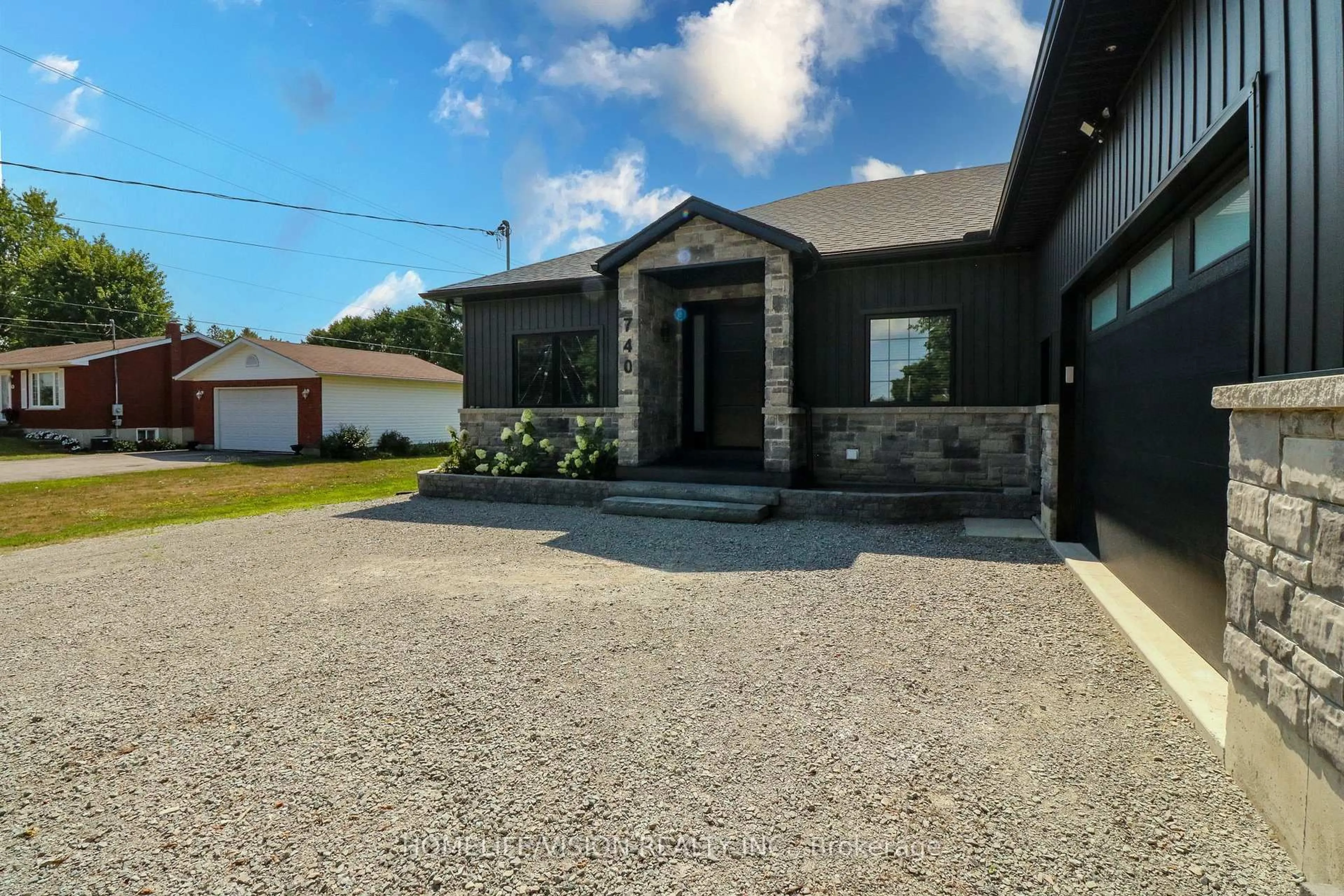 A pic from outside/outdoor area/front of a property/back of a property/a pic from drone, street for 740 Midland Ave, Tay Ontario L0K 1R0