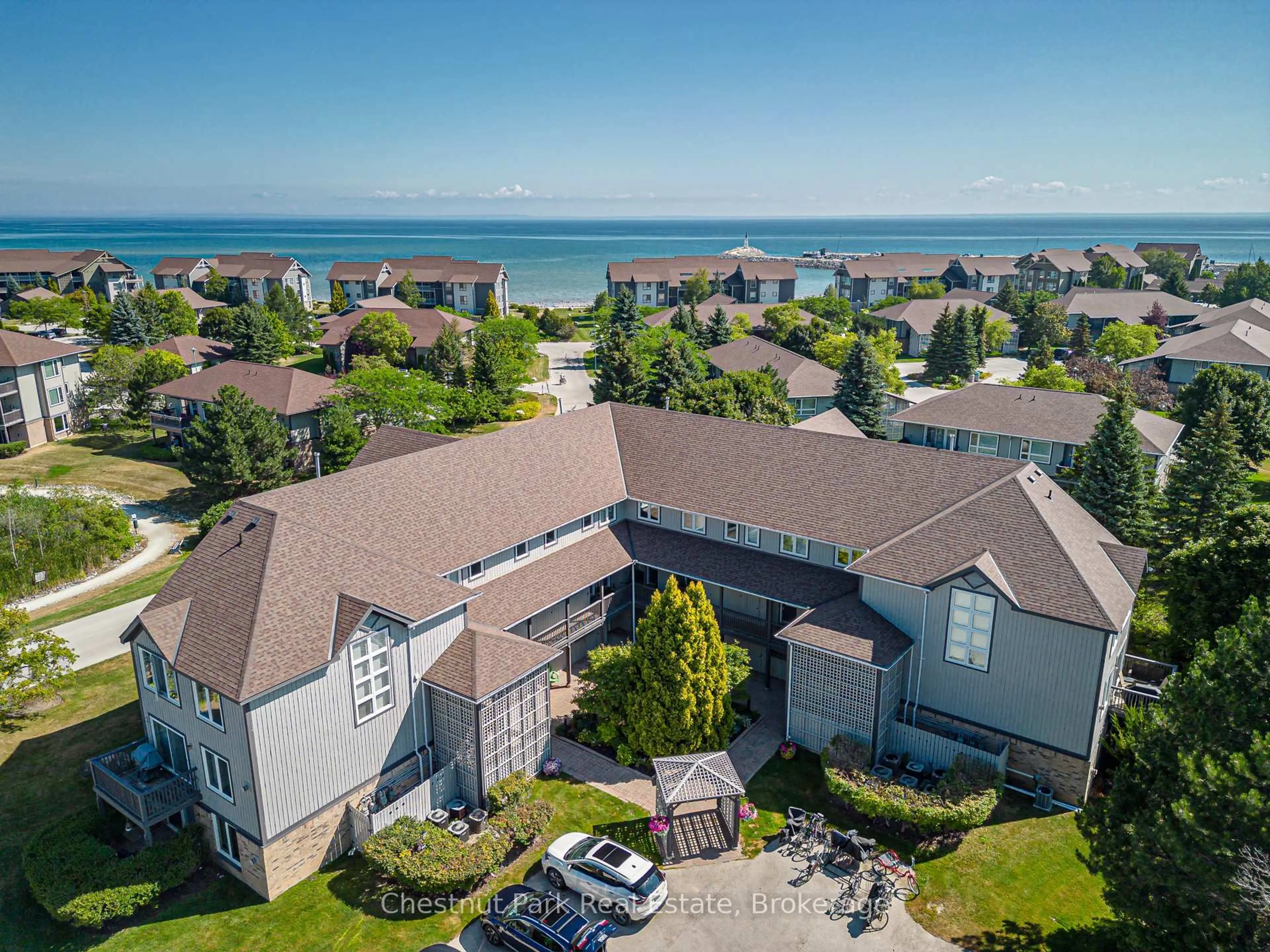 A pic from outside/outdoor area/front of a property/back of a property/a pic from drone, water/lake/river/ocean view for 701 Johnston Park Ave, Collingwood Ontario L9Y 5C7