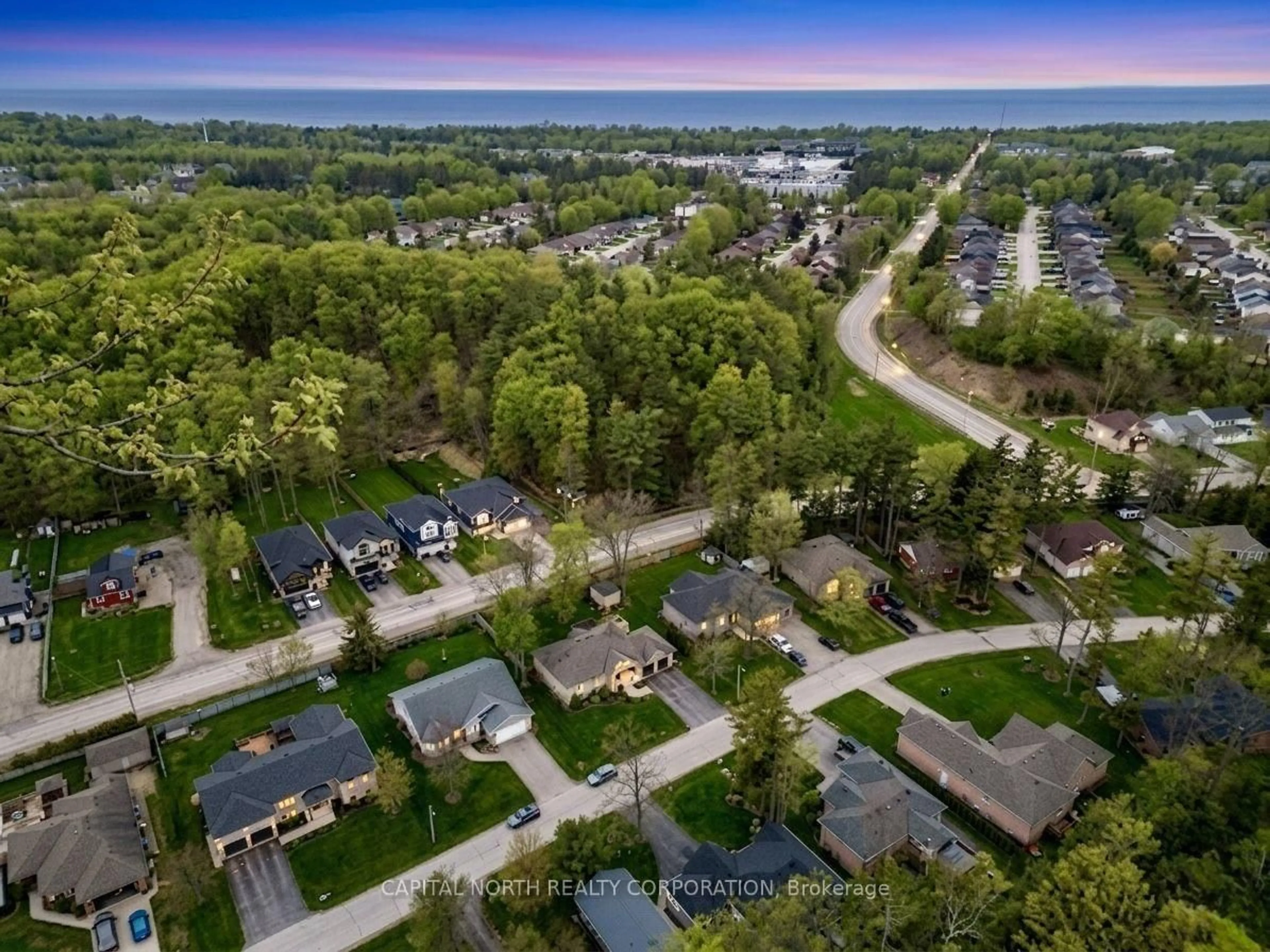 A pic from outside/outdoor area/front of a property/back of a property/a pic from drone, street for 8 Downer Cres, Wasaga Beach Ontario L9Z 1C2