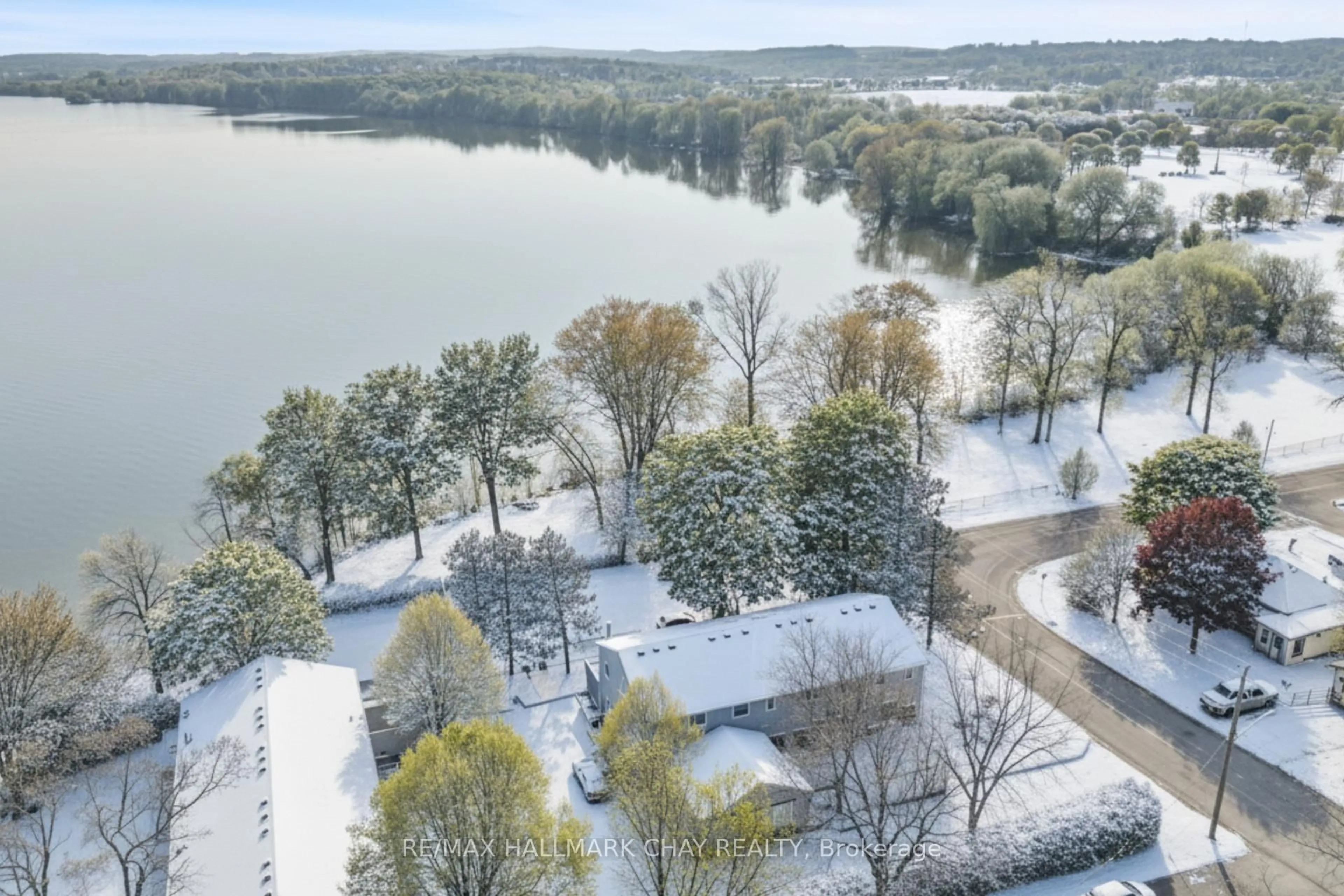 A pic from outside/outdoor area/front of a property/back of a property/a pic from drone, water/lake/river/ocean view for 1 Olive Cres #4, Orillia Ontario L3V 7N5