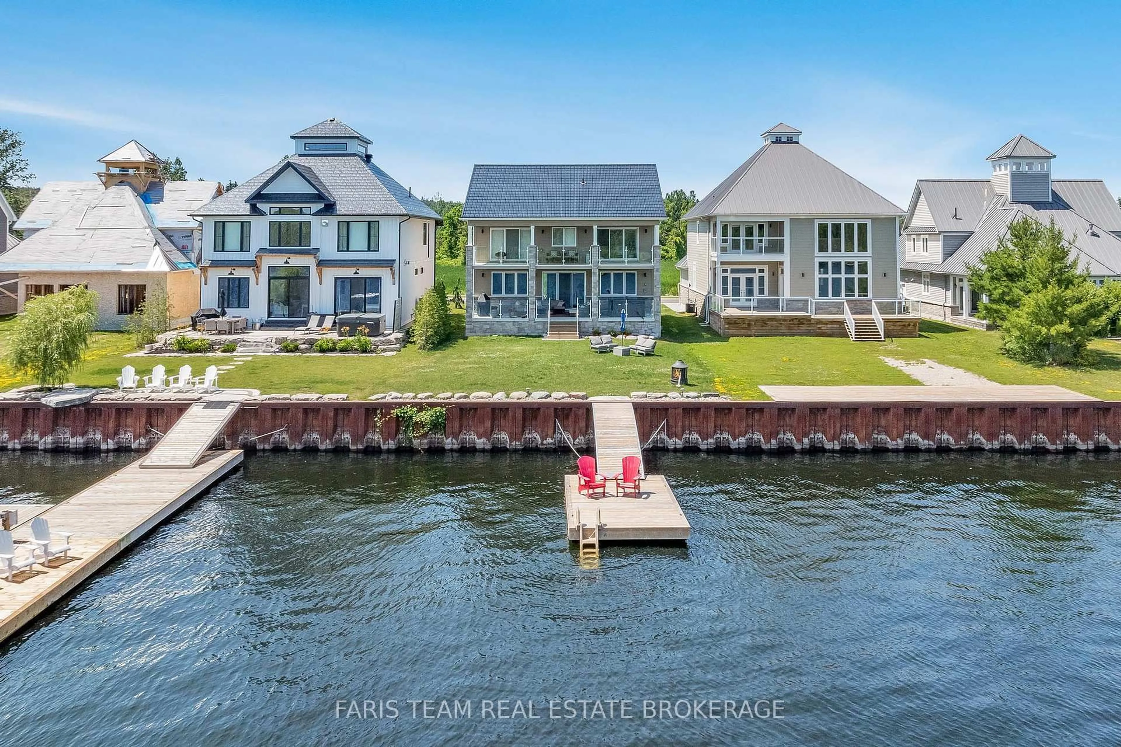A pic from outside/outdoor area/front of a property/back of a property/a pic from drone, water/lake/river/ocean view for 7 Dock Lane, Tay Ontario L0K 1R0