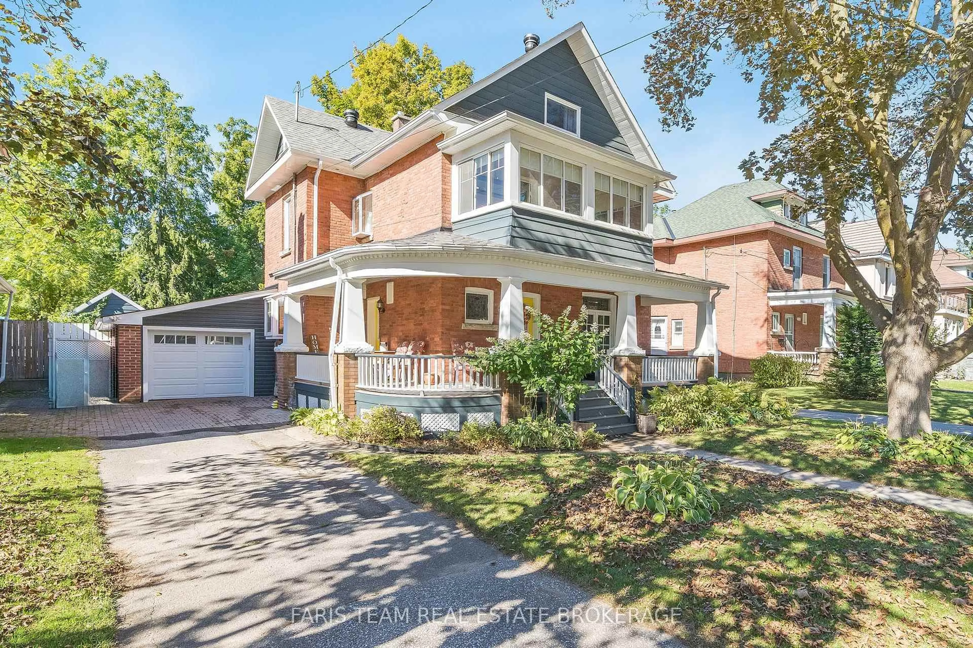 Home with brick exterior material, street for 404 Manly St, Midland Ontario L4R 3E3