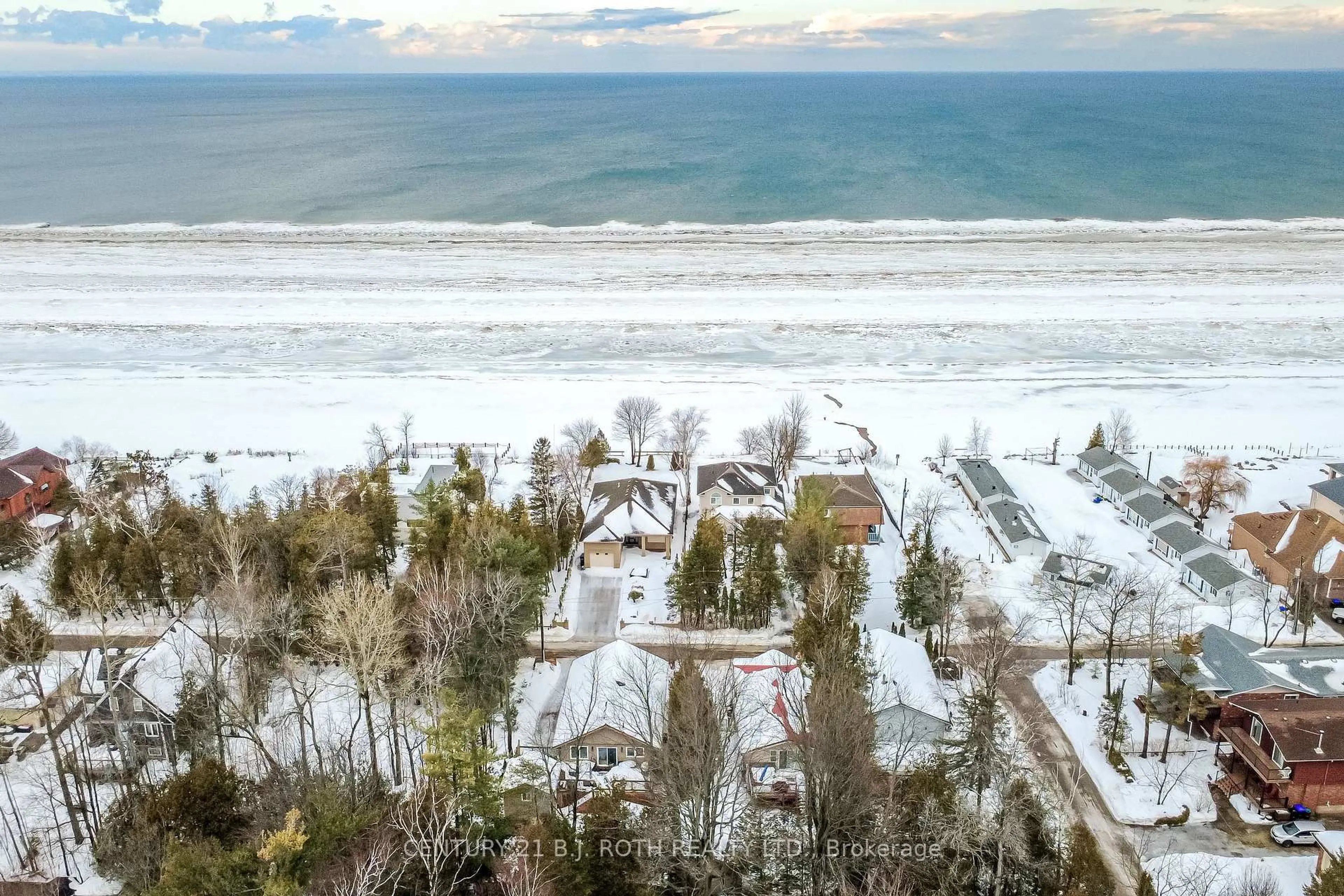 A pic from outside/outdoor area/front of a property/back of a property/a pic from drone, water/lake/river/ocean view for 991 Shore Lane, Wasaga Beach Ontario L9Z 2B4