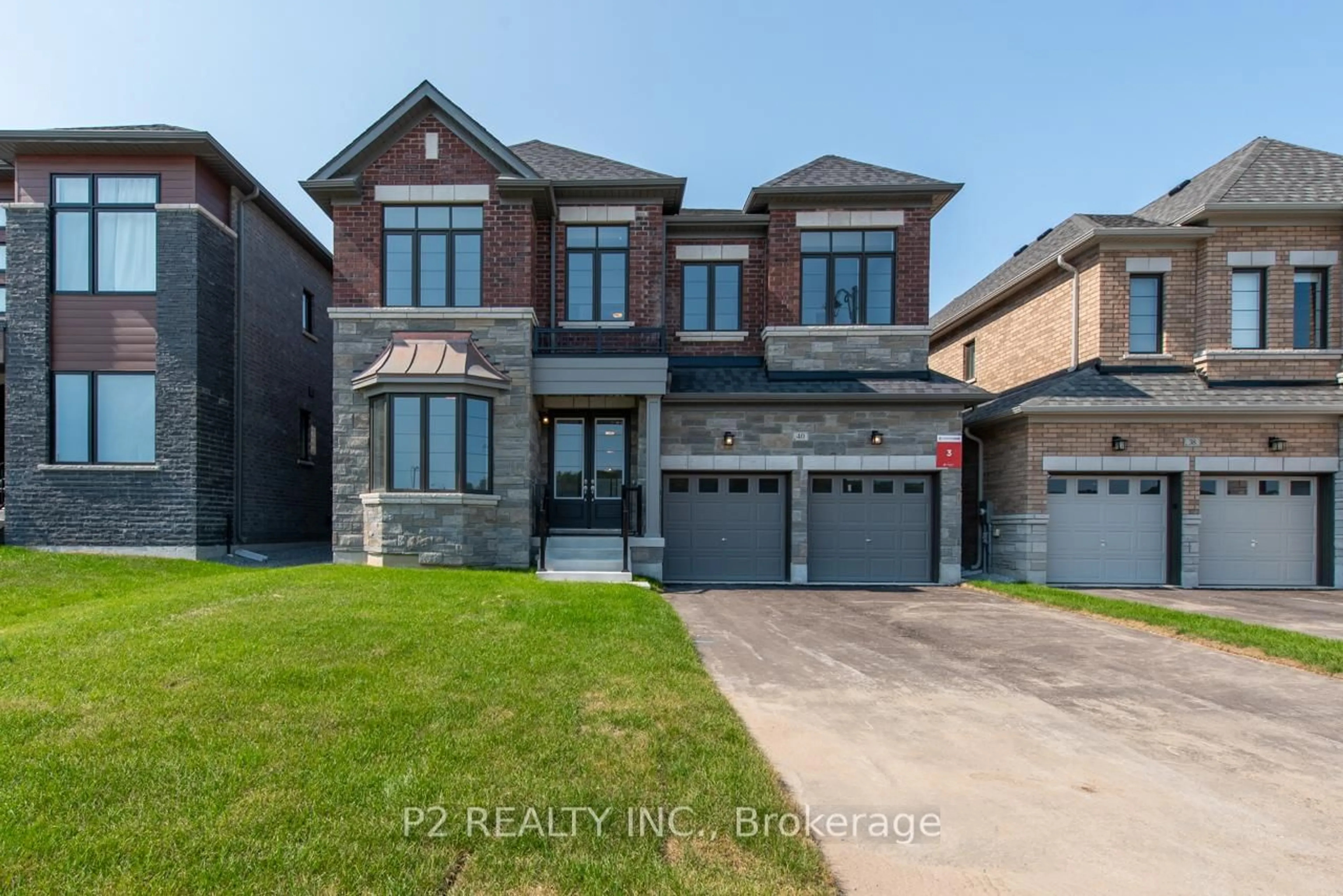 Home with brick exterior material, street for 40 Wild Ginger Lane, Springwater Ontario L9X 2C9