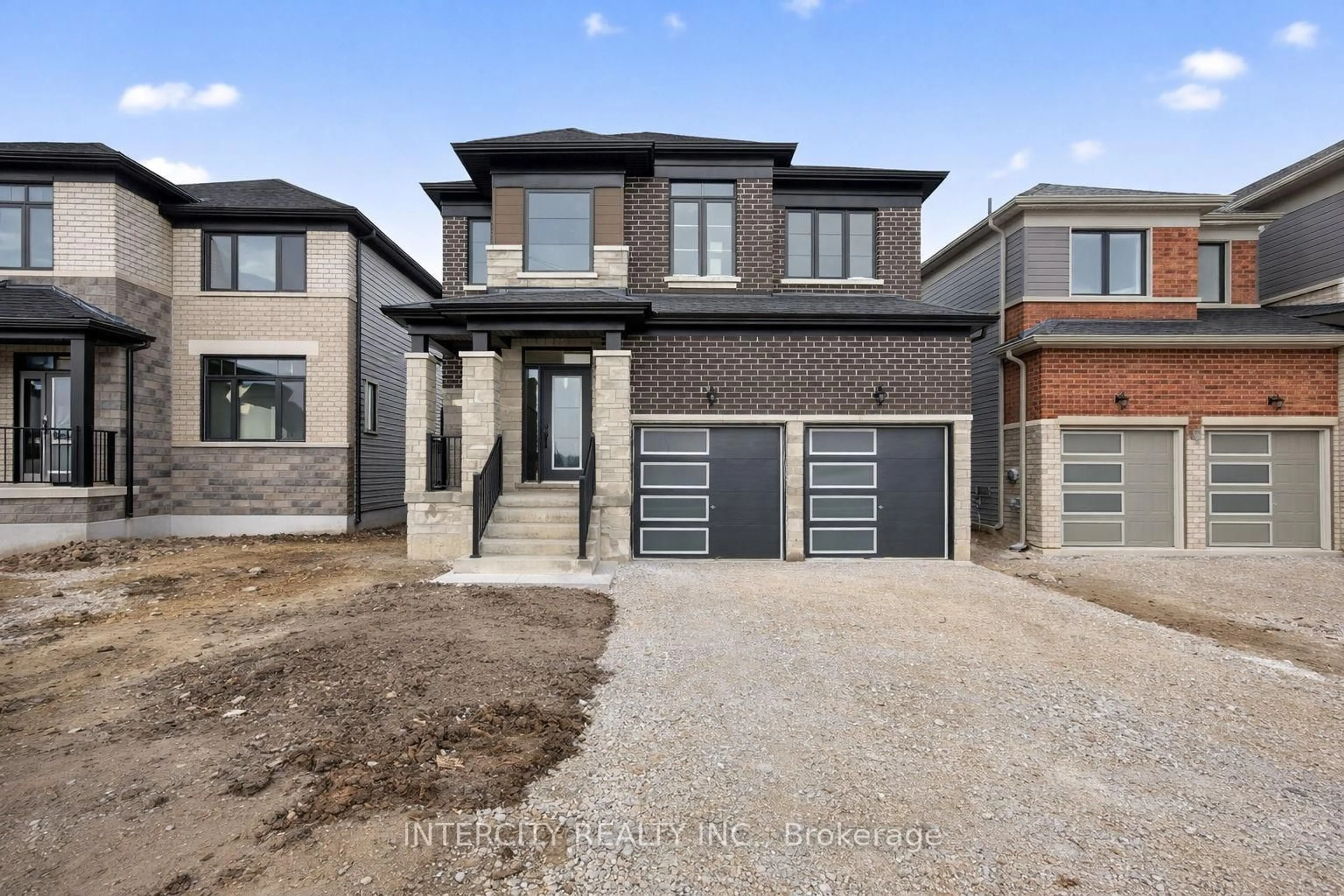 Home with brick exterior material, street for 34 Legacy Circ, Wasaga Beach Ontario L9Z 0M5