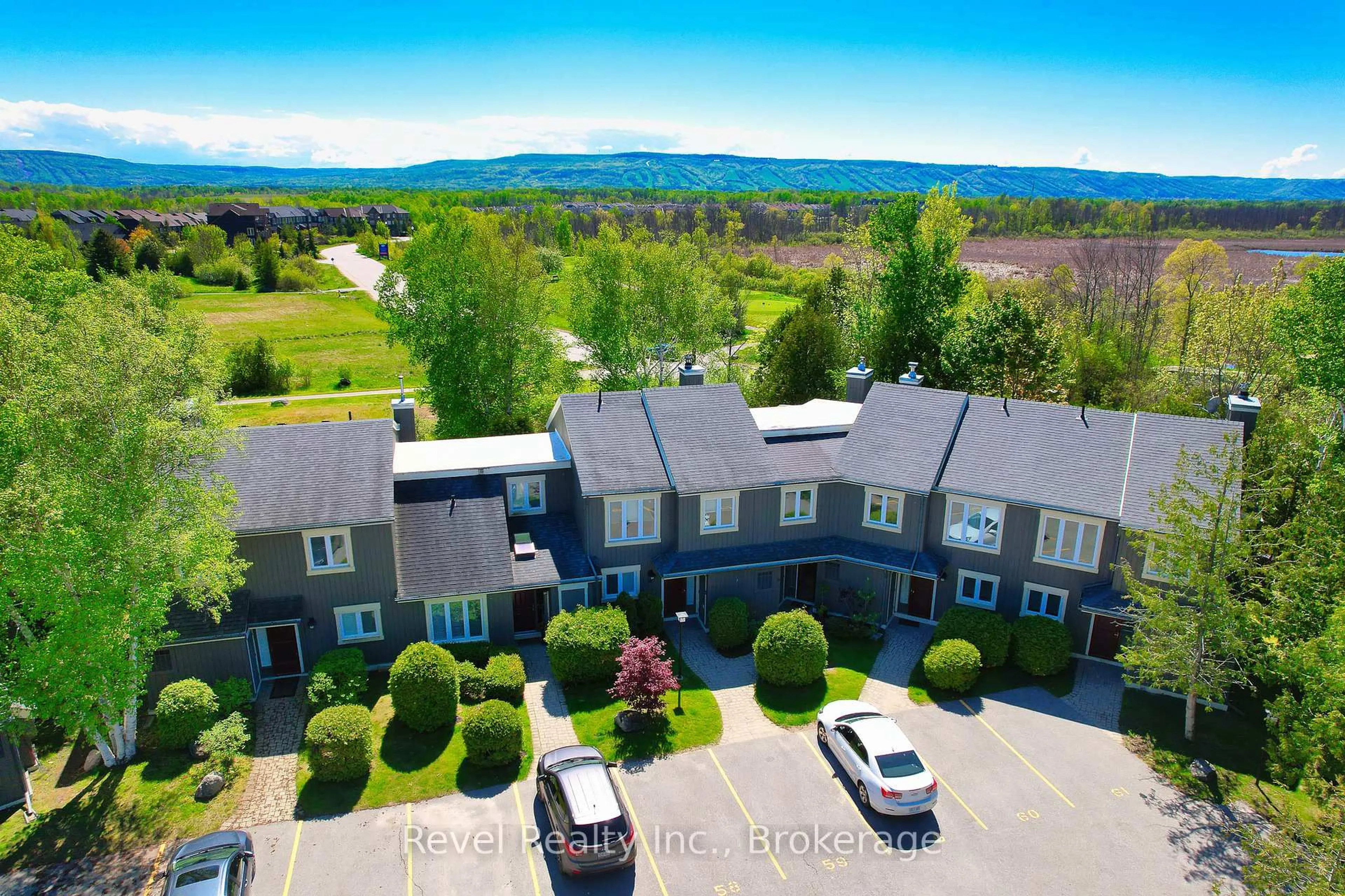 A pic from outside/outdoor area/front of a property/back of a property/a pic from drone, water/lake/river/ocean view for 145 Fairway Cres #58, Collingwood Ontario L9Y 5B4