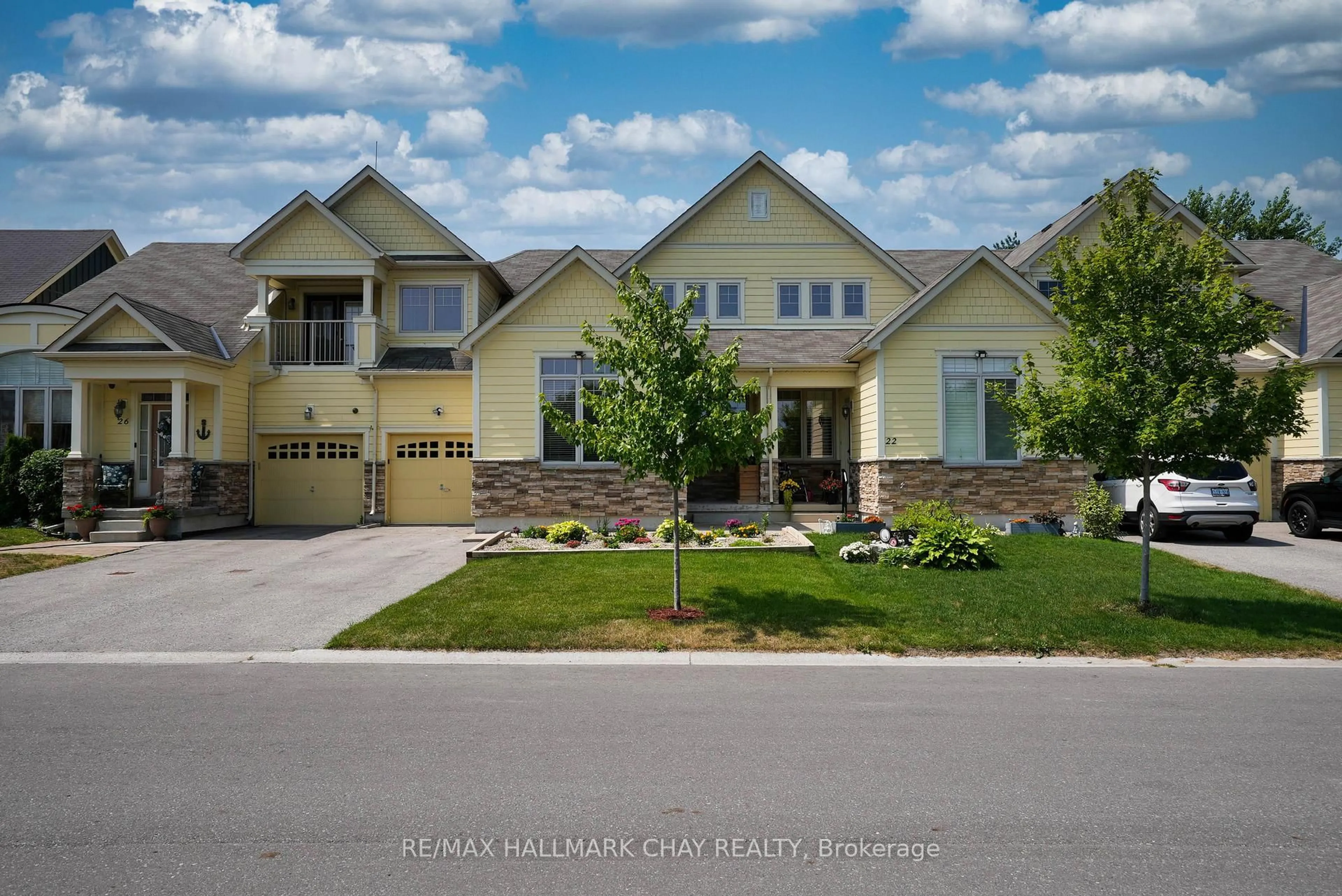 Home with brick exterior material, street for 24 Beachway Tr, Wasaga Beach Ontario L9Z 0G1