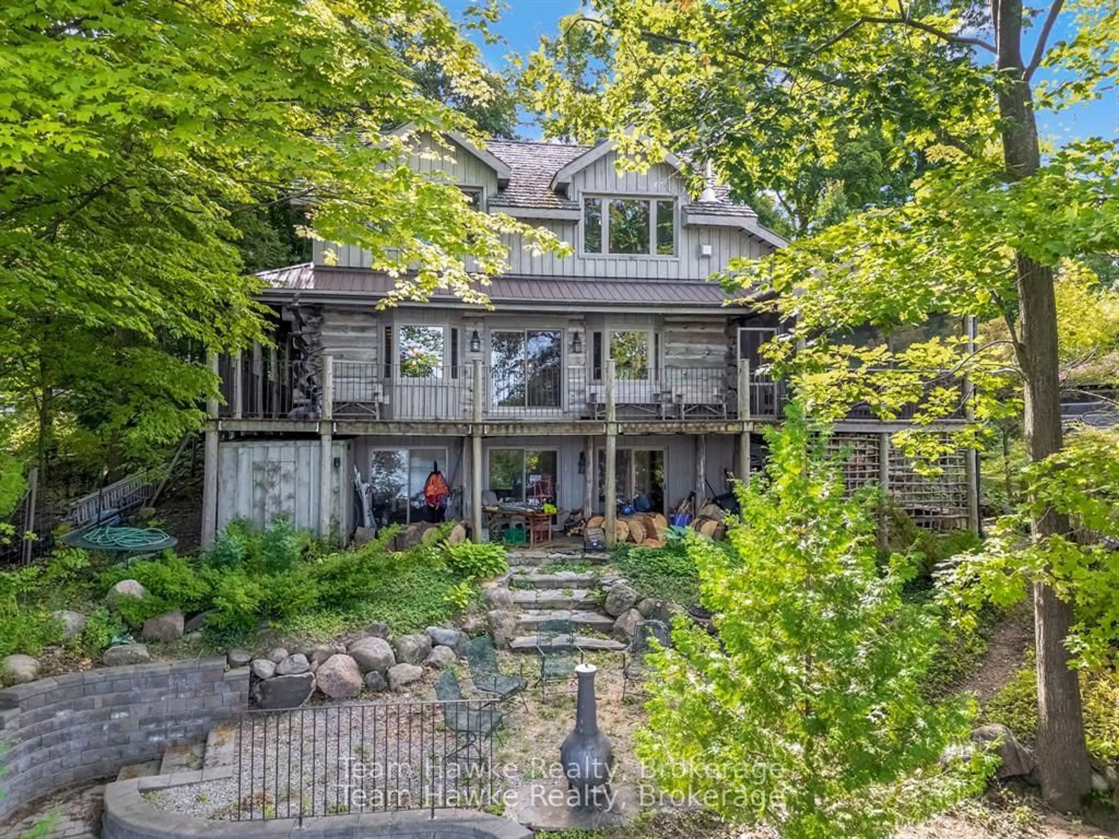 A pic from outside/outdoor area/front of a property/back of a property/a pic from drone, water/lake/river/ocean view for 968 Sumac Lane, Midland Ontario L4R 4P4