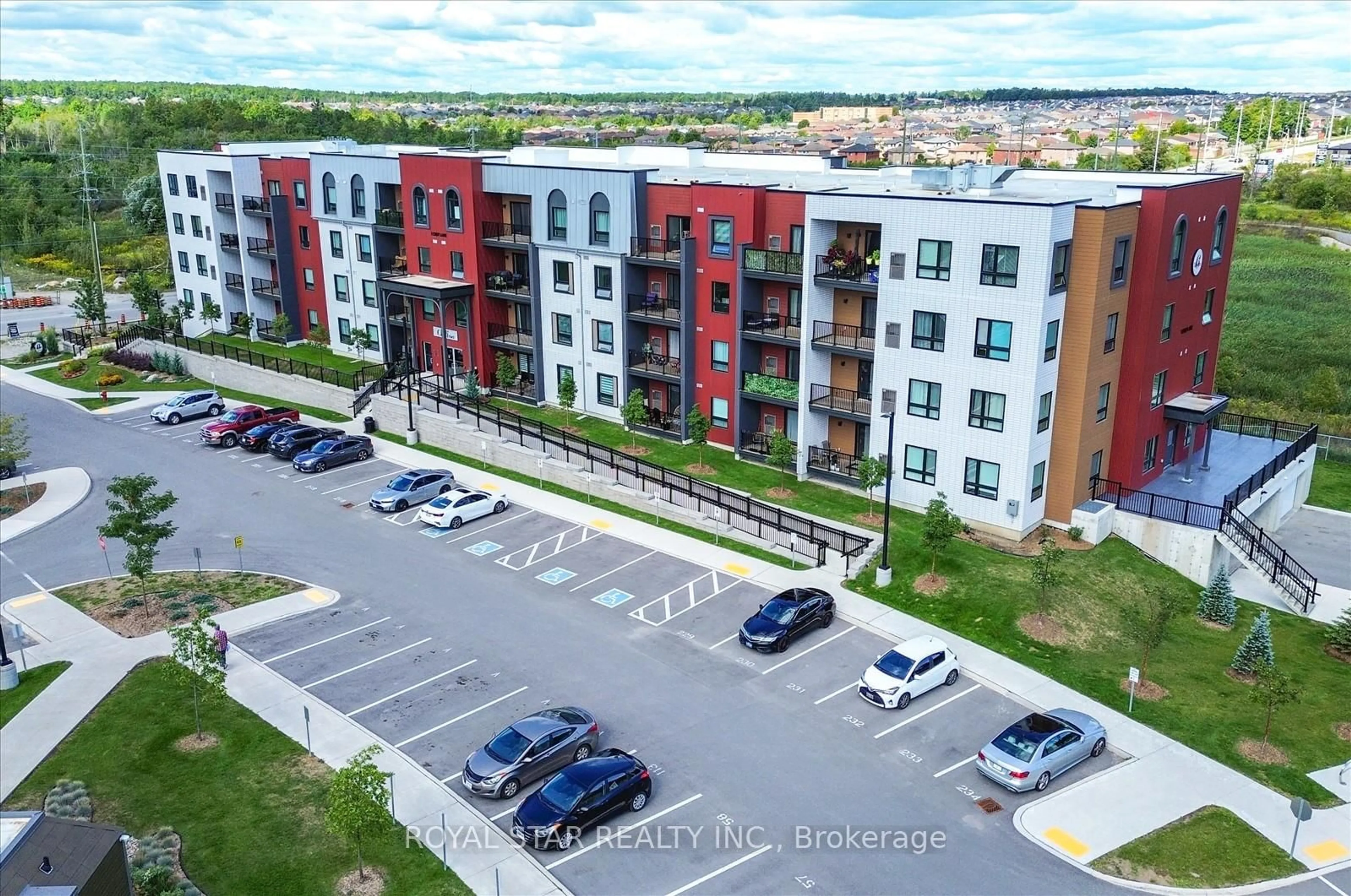 A pic from outside/outdoor area/front of a property/back of a property/a pic from drone, street for 1 Chef Lane #401, Barrie Ontario L9J 0T1