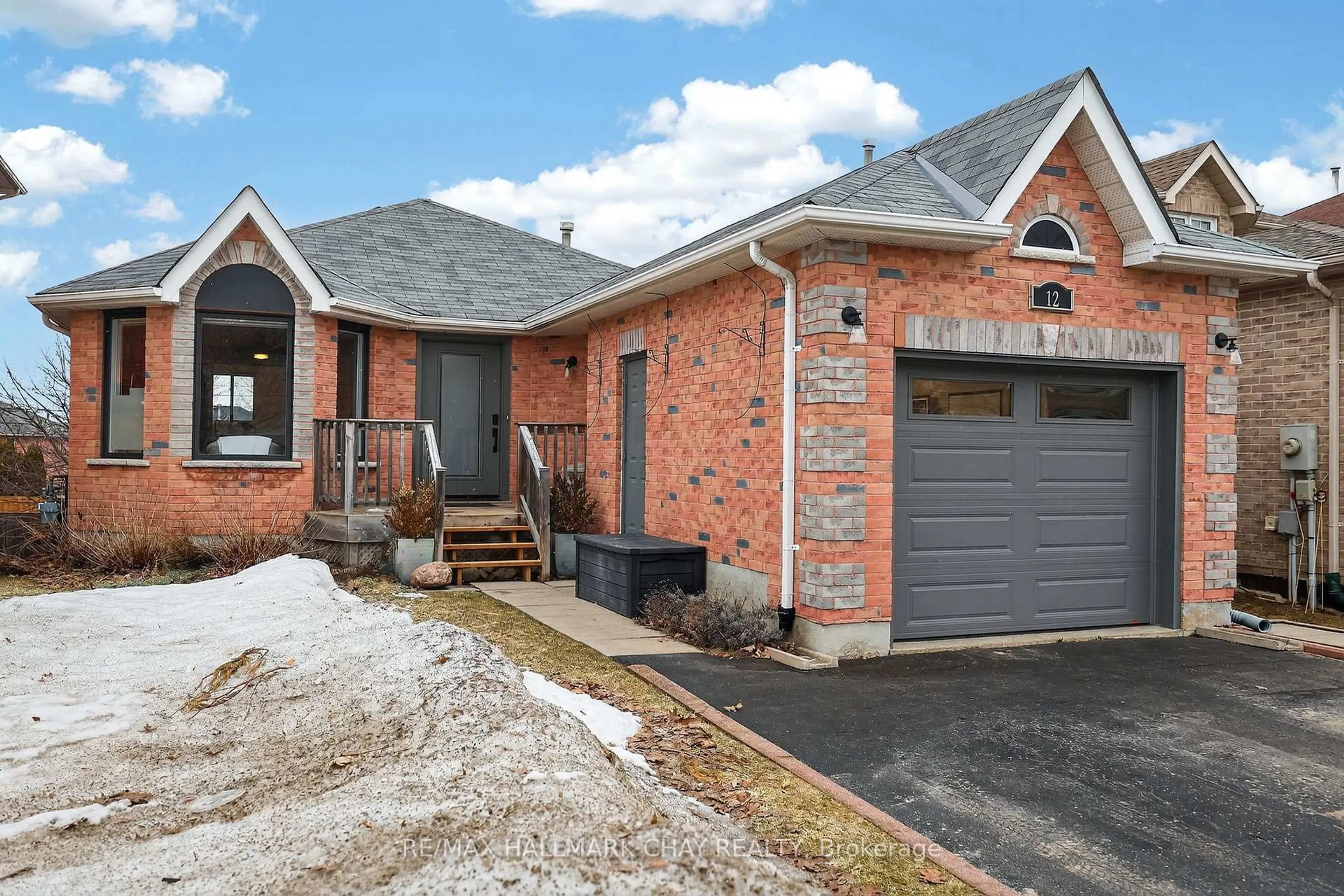 Home with brick exterior material, street for 12 Dunnett Dr, Barrie Ontario L4N 0H9