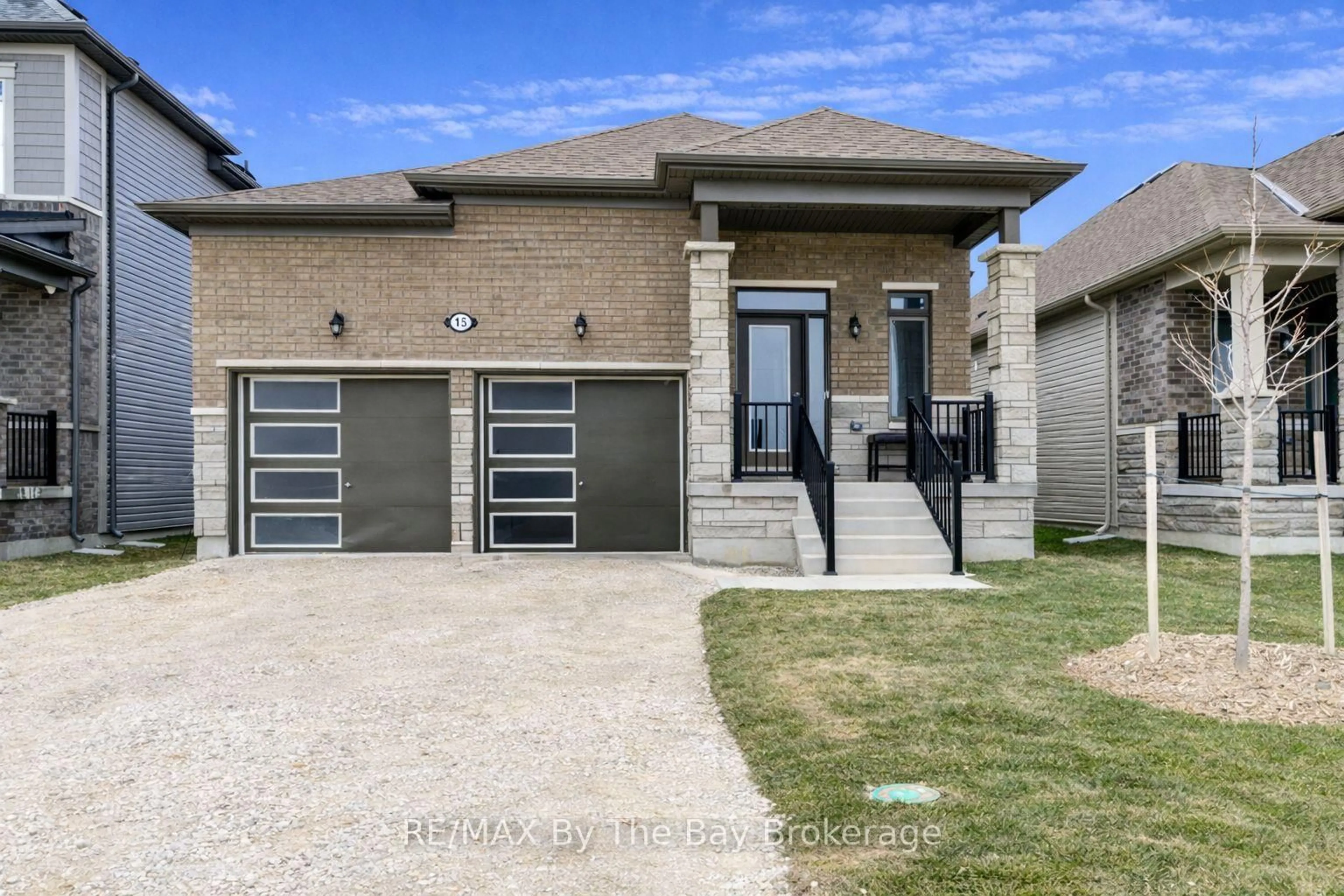 Home with brick exterior material, street for 15 Union Blvd, Wasaga Beach Ontario L9Z 0M6