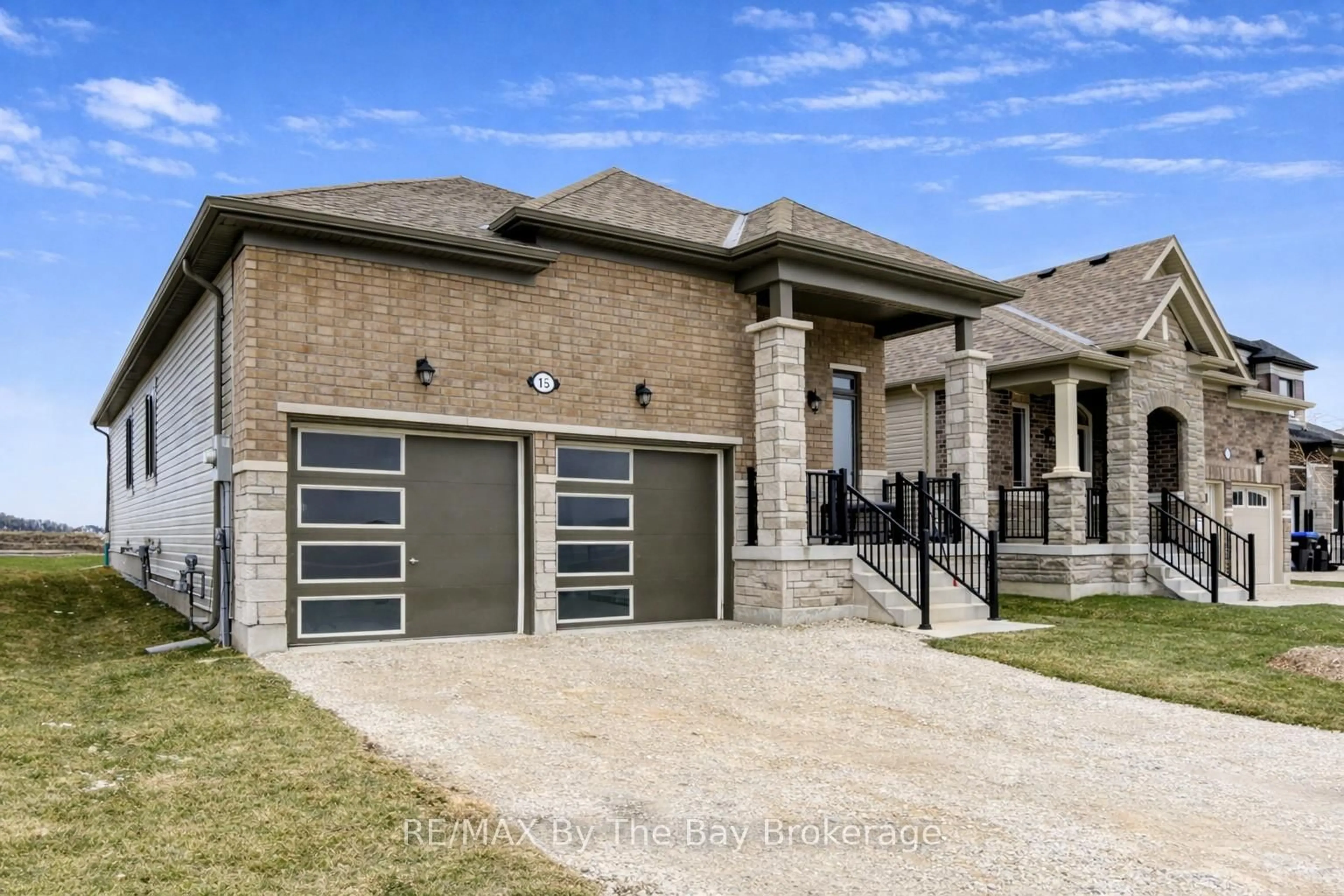 Home with brick exterior material, street for 15 Union Blvd, Wasaga Beach Ontario L9Z 0M6