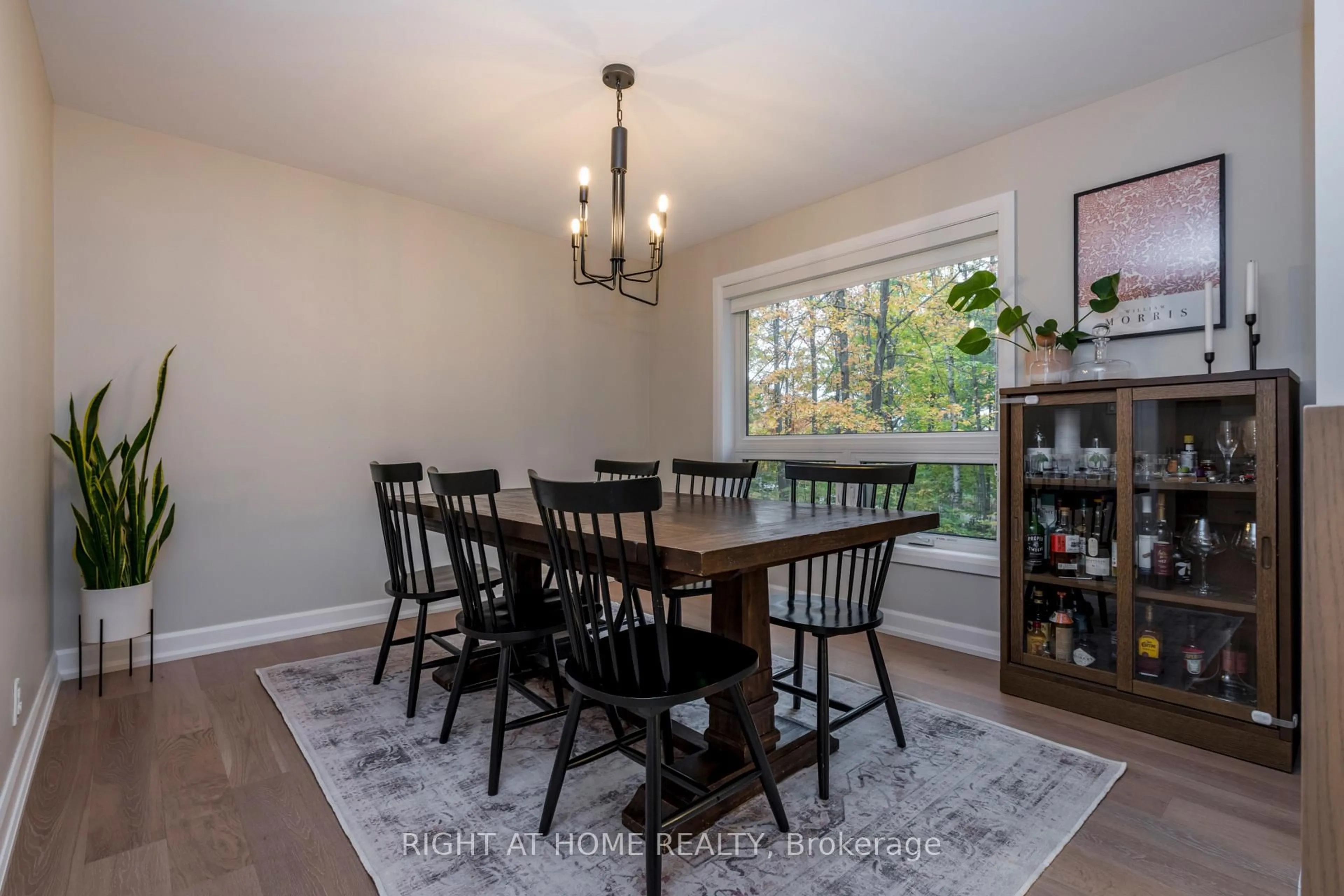 Dining room, wood/laminate floor for 11 Woodland Cres, Oro-Medonte Ontario L4M 4Y8