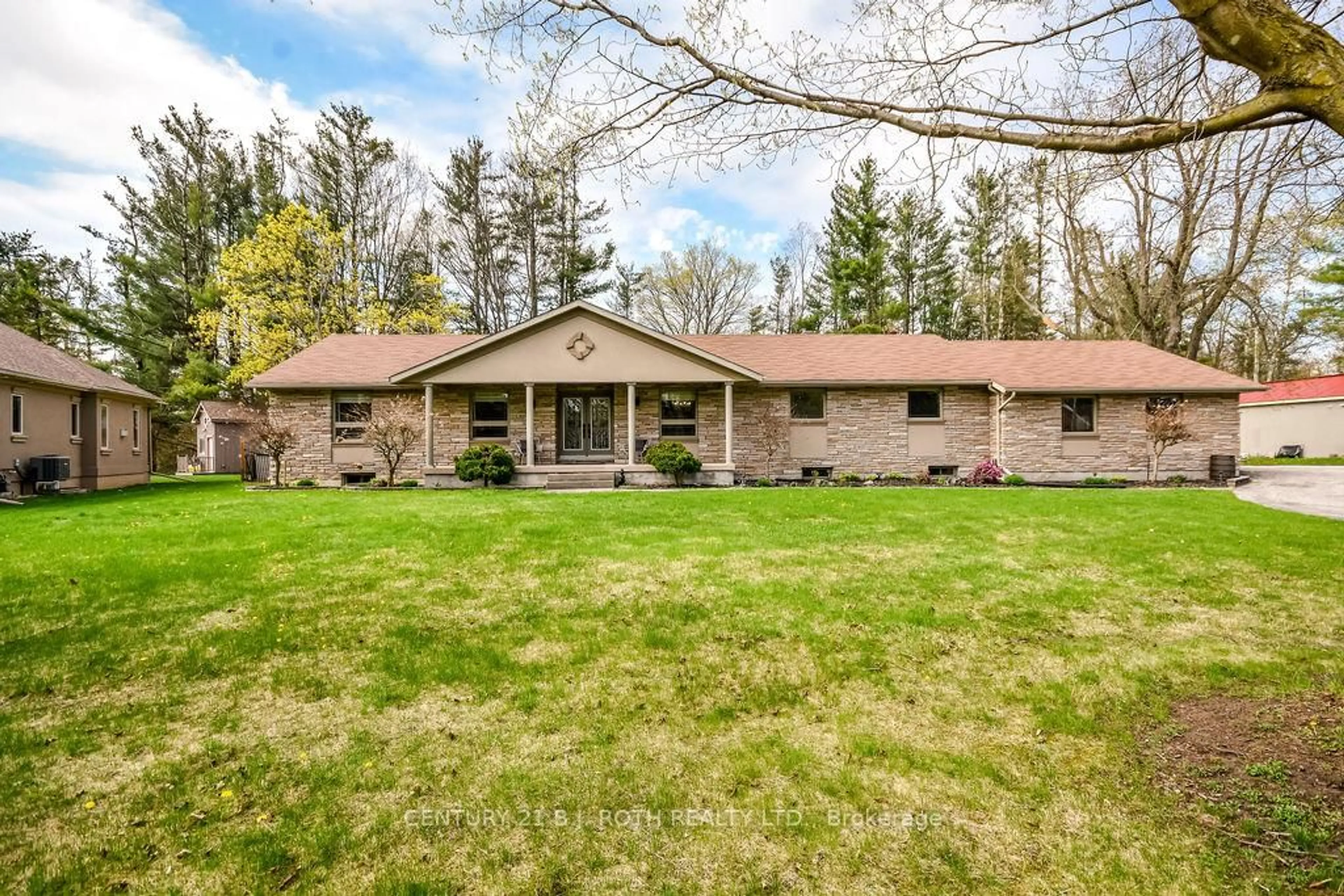 A pic from outside/outdoor area/front of a property/back of a property/a pic from drone, unknown for 12 Noraline Ave, Springwater Ontario L0L 1X1