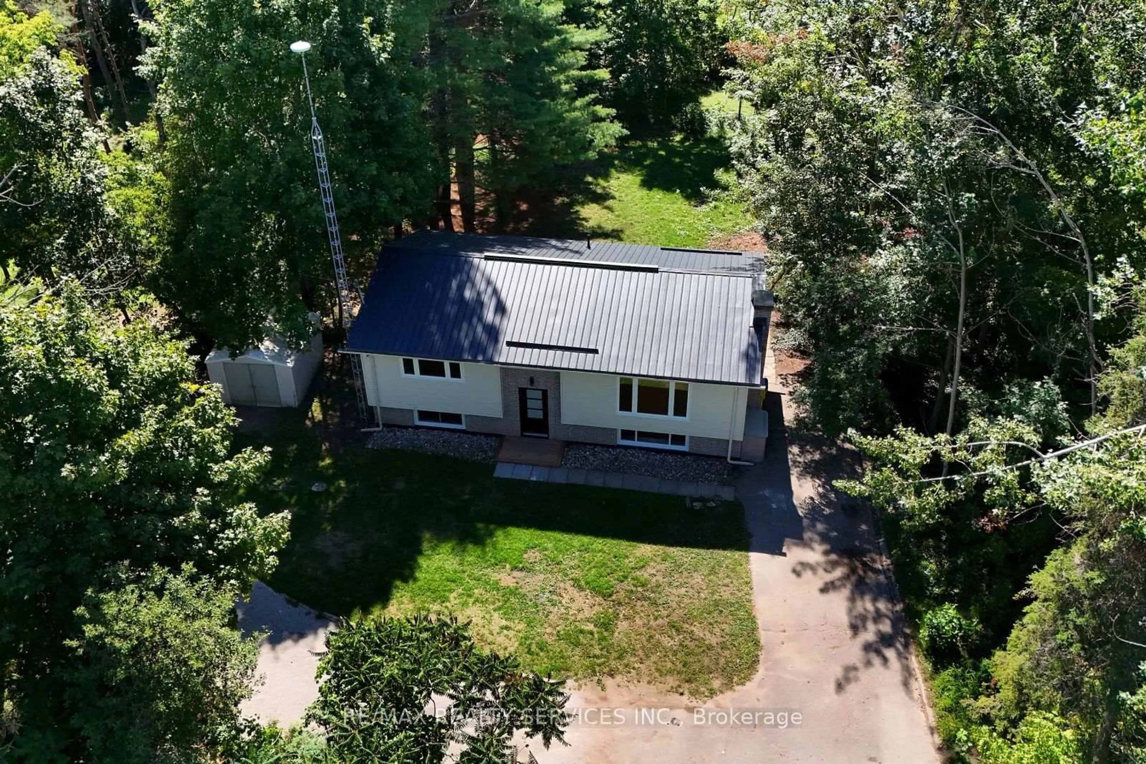 A pic from outside/outdoor area/front of a property/back of a property/a pic from drone, street for 8570 Hwy 12, Oro-Medonte Ontario L3V 0K1