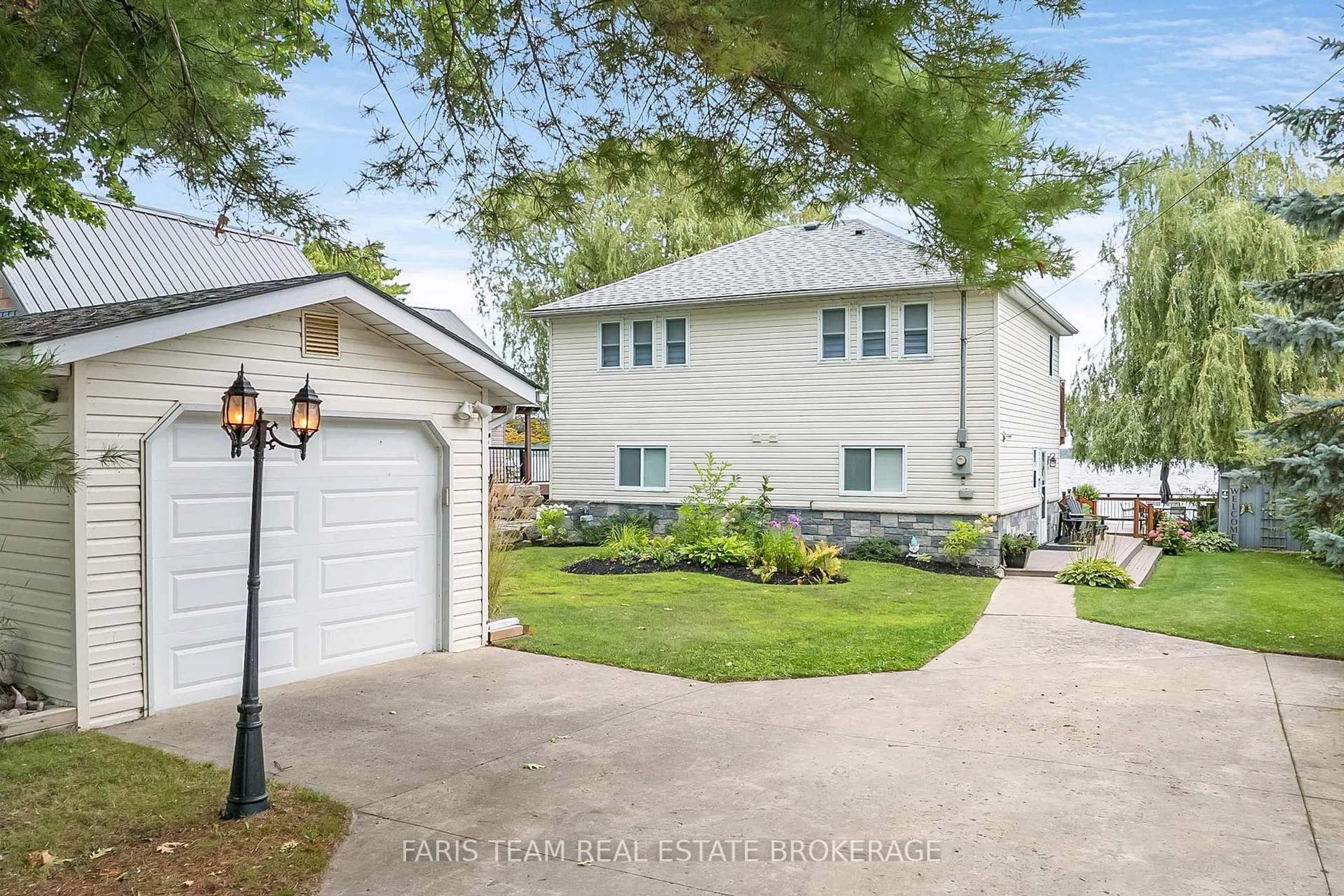 Home with vinyl exterior material, street for 282 Robins Point Rd, Tay Ontario L0K 2A0