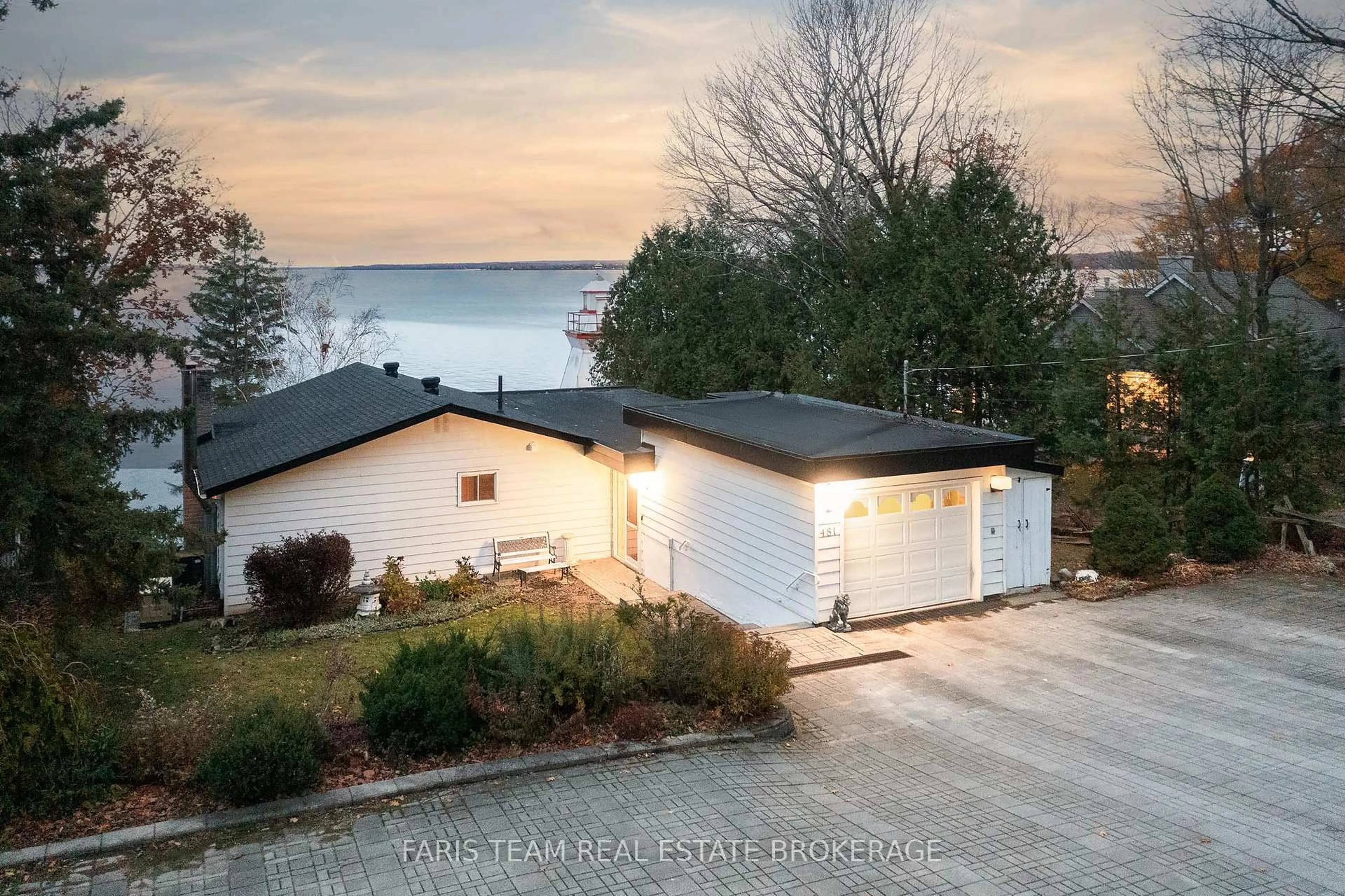 A pic from outside/outdoor area/front of a property/back of a property/a pic from drone, water/lake/river/ocean view for 481 Islandview Lane, Midland Ontario L4R 5H4