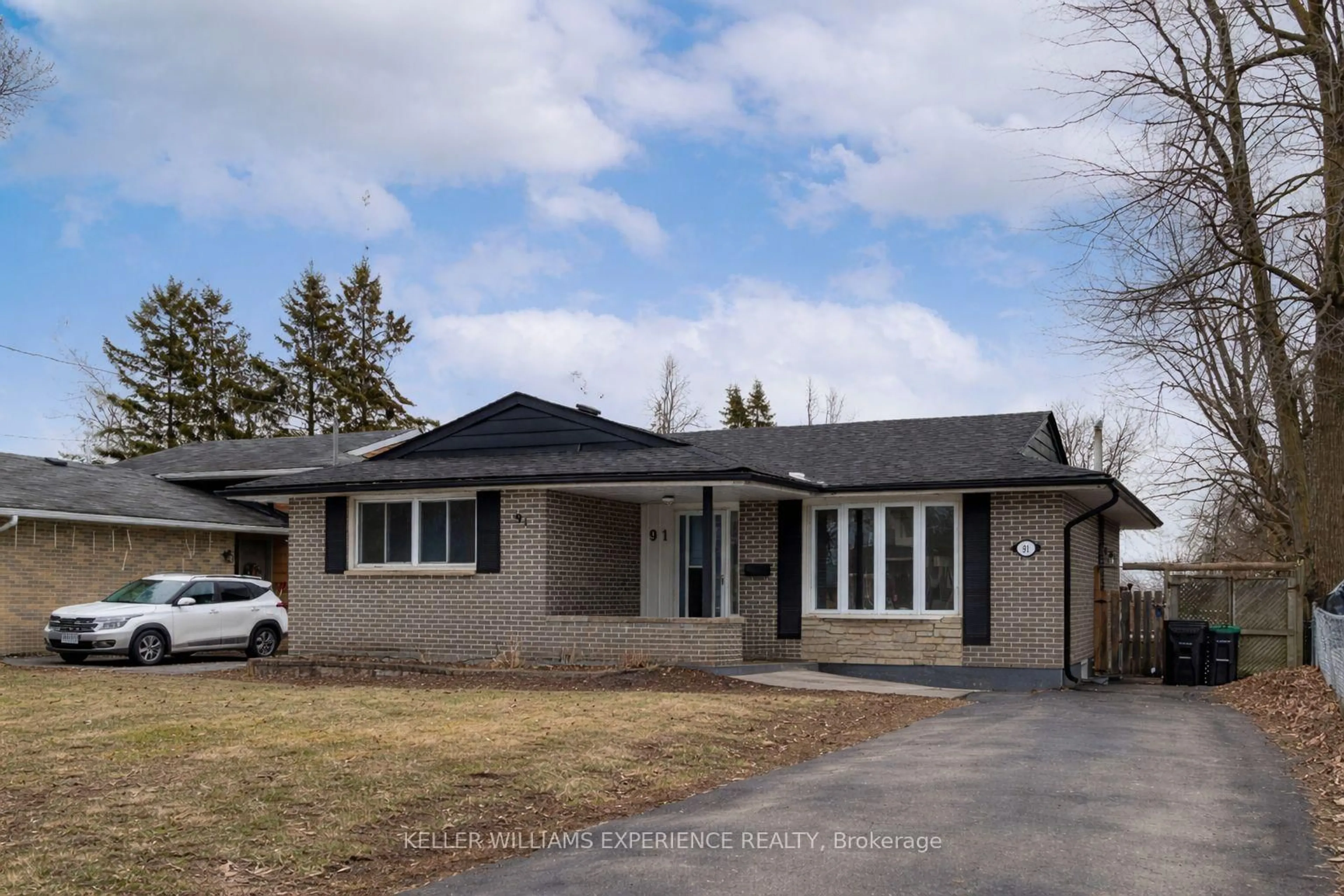 Home with brick exterior material, street for 91 Cundles Rd, Barrie Ontario L4M 2Z8
