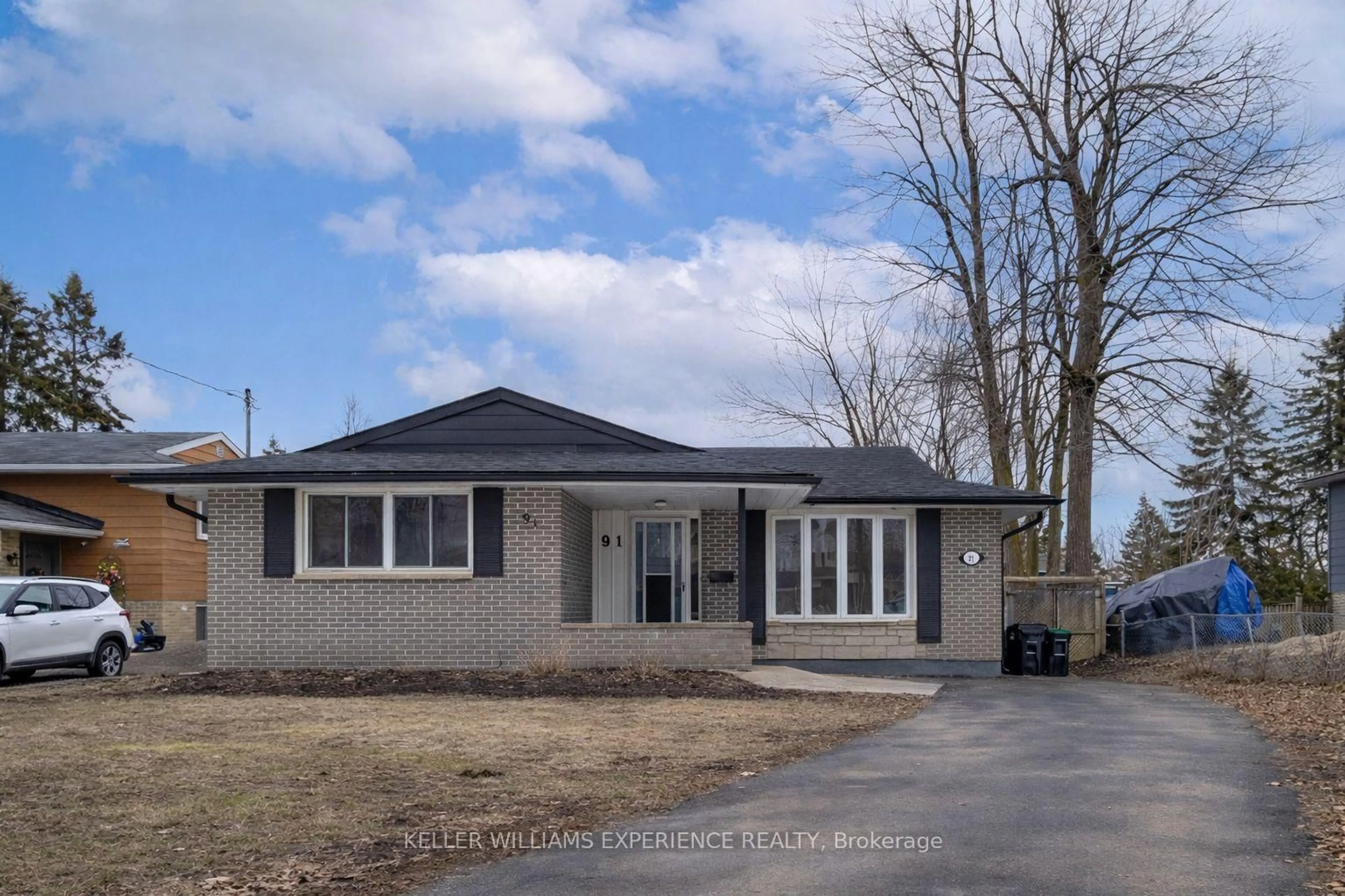 Home with brick exterior material, street for 91 Cundles Rd, Barrie Ontario L4M 2Z8