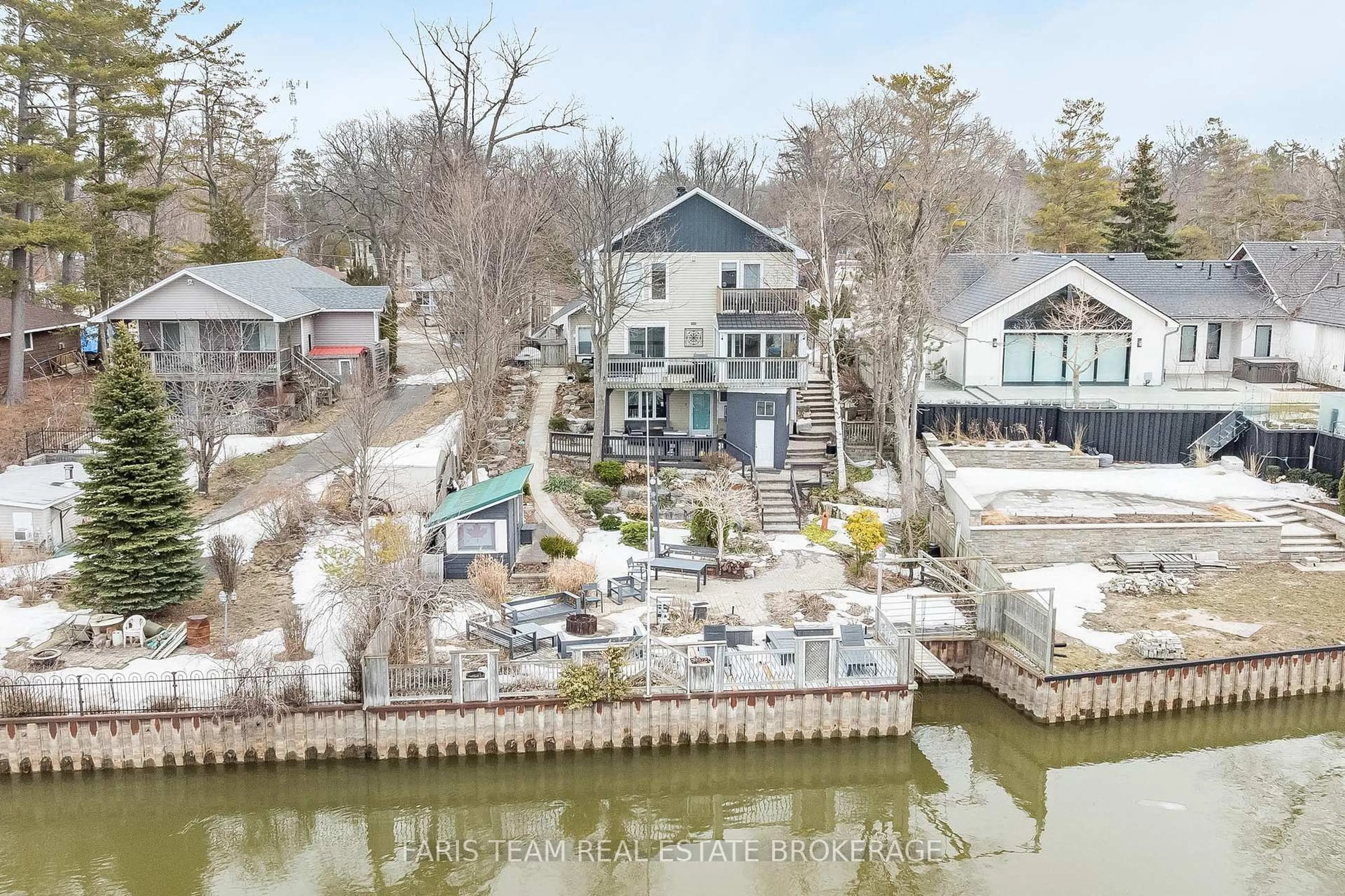 A pic from outside/outdoor area/front of a property/back of a property/a pic from drone, water/lake/river/ocean view for 60 River Avenue Cres, Wasaga Beach Ontario L9Z 2K6