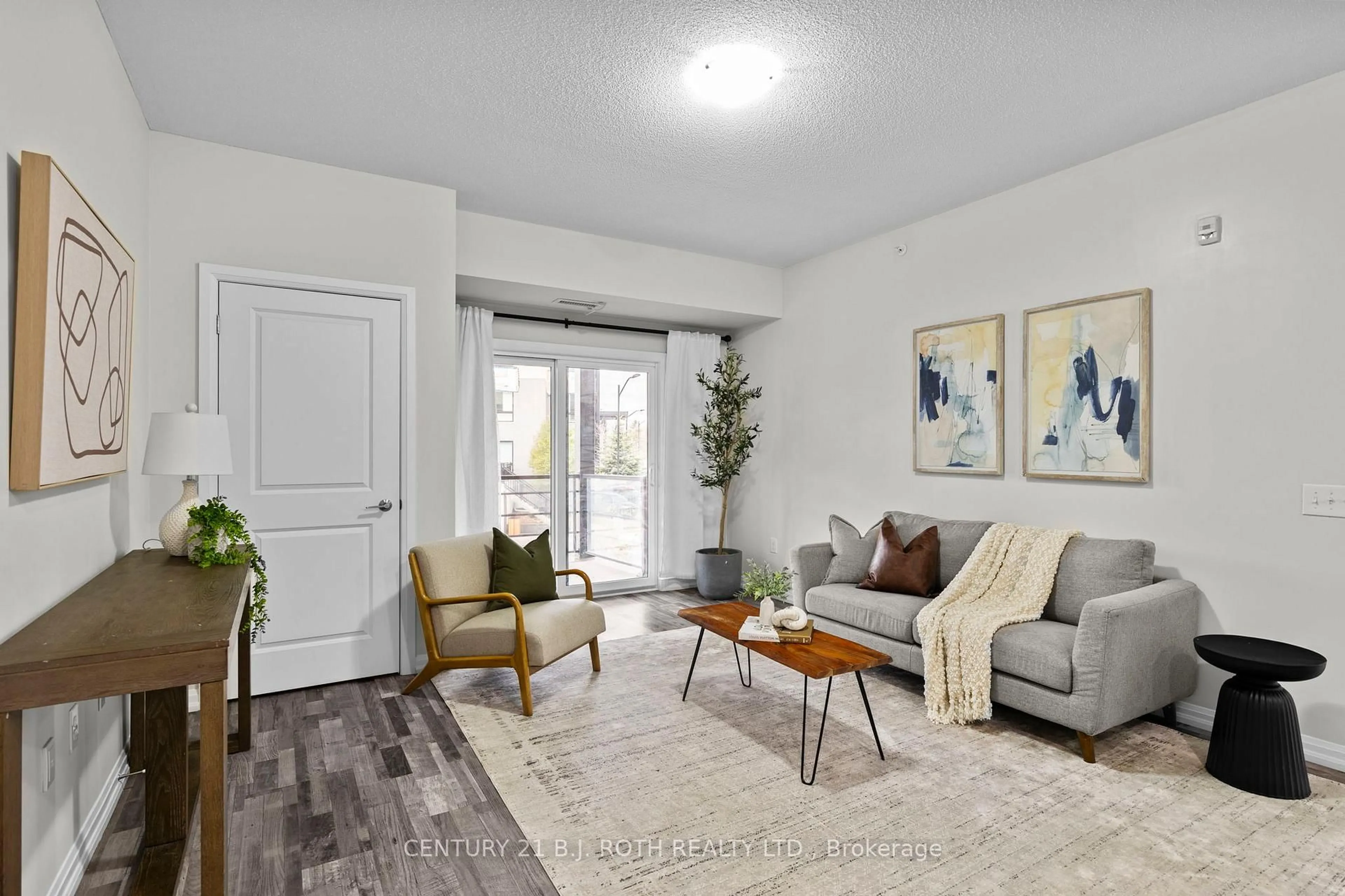 Living room with furniture, unknown for 302 ESSA Rd #115, Barrie Ontario L9J 0H3