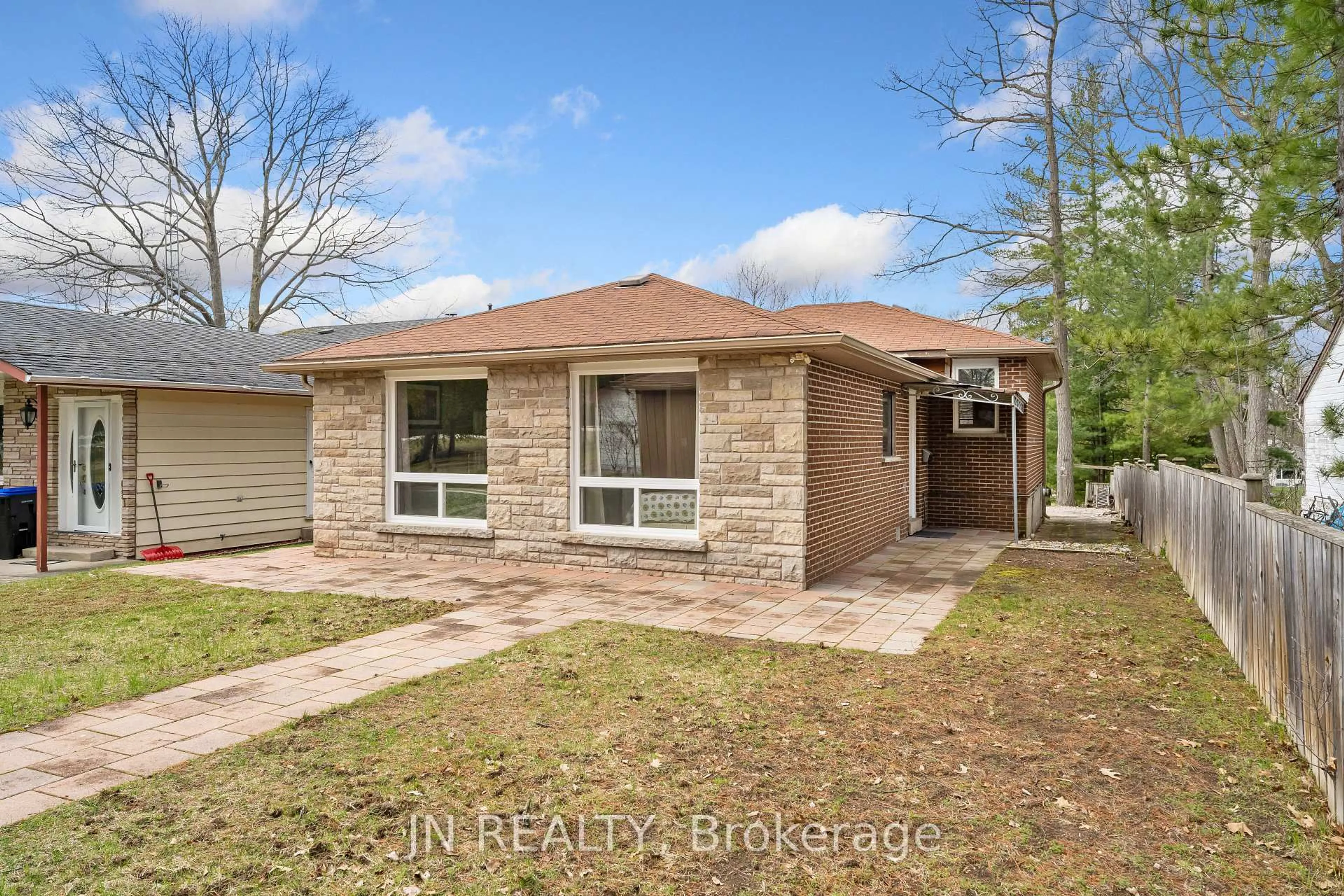 Home with brick exterior material, street for 322 Oxbow Park Dr, Wasaga Beach Ontario L9Z 2V6