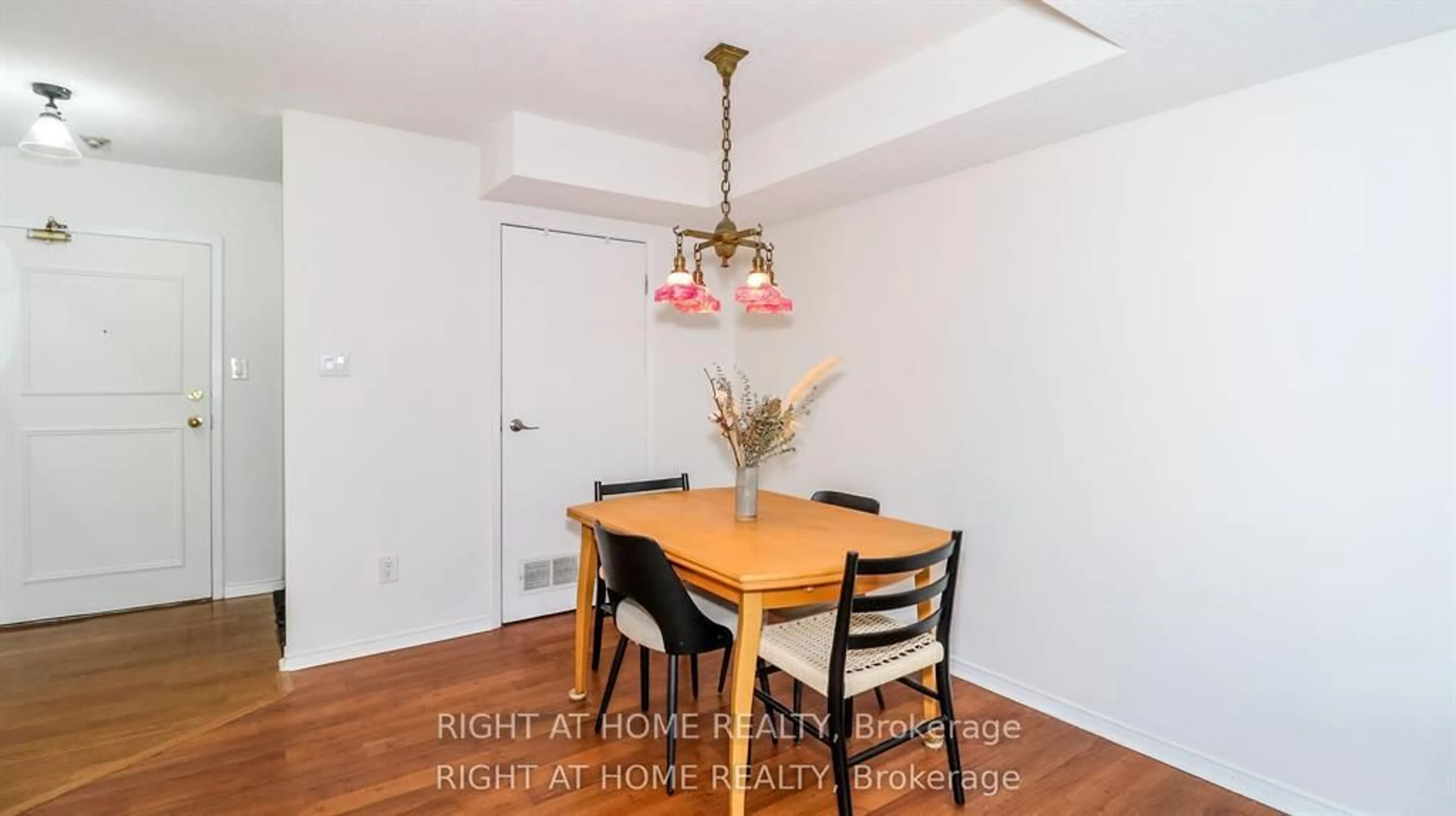 Dining room, wood/laminate floor for 126 Bell Farm Rd #113, Barrie Ontario L4M 6J3