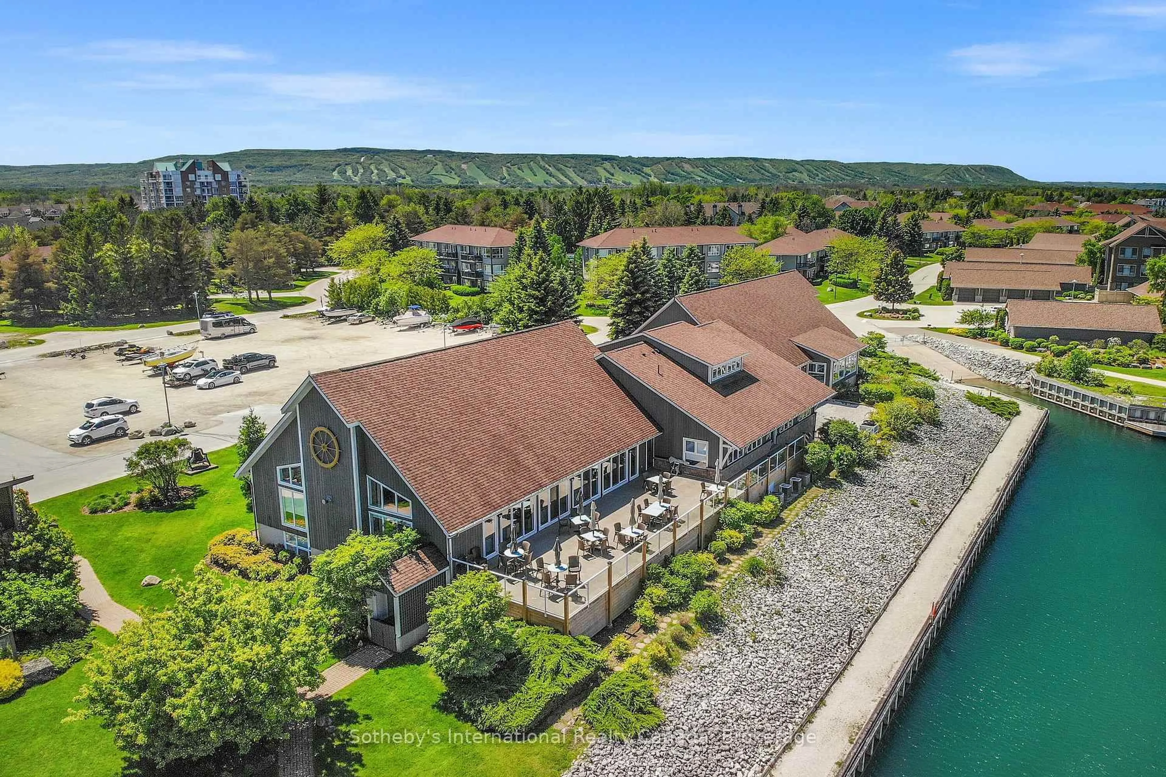 A pic from outside/outdoor area/front of a property/back of a property/a pic from drone, water/lake/river/ocean view for 331 MARINERS Way, Collingwood Ontario L9Y 5C7