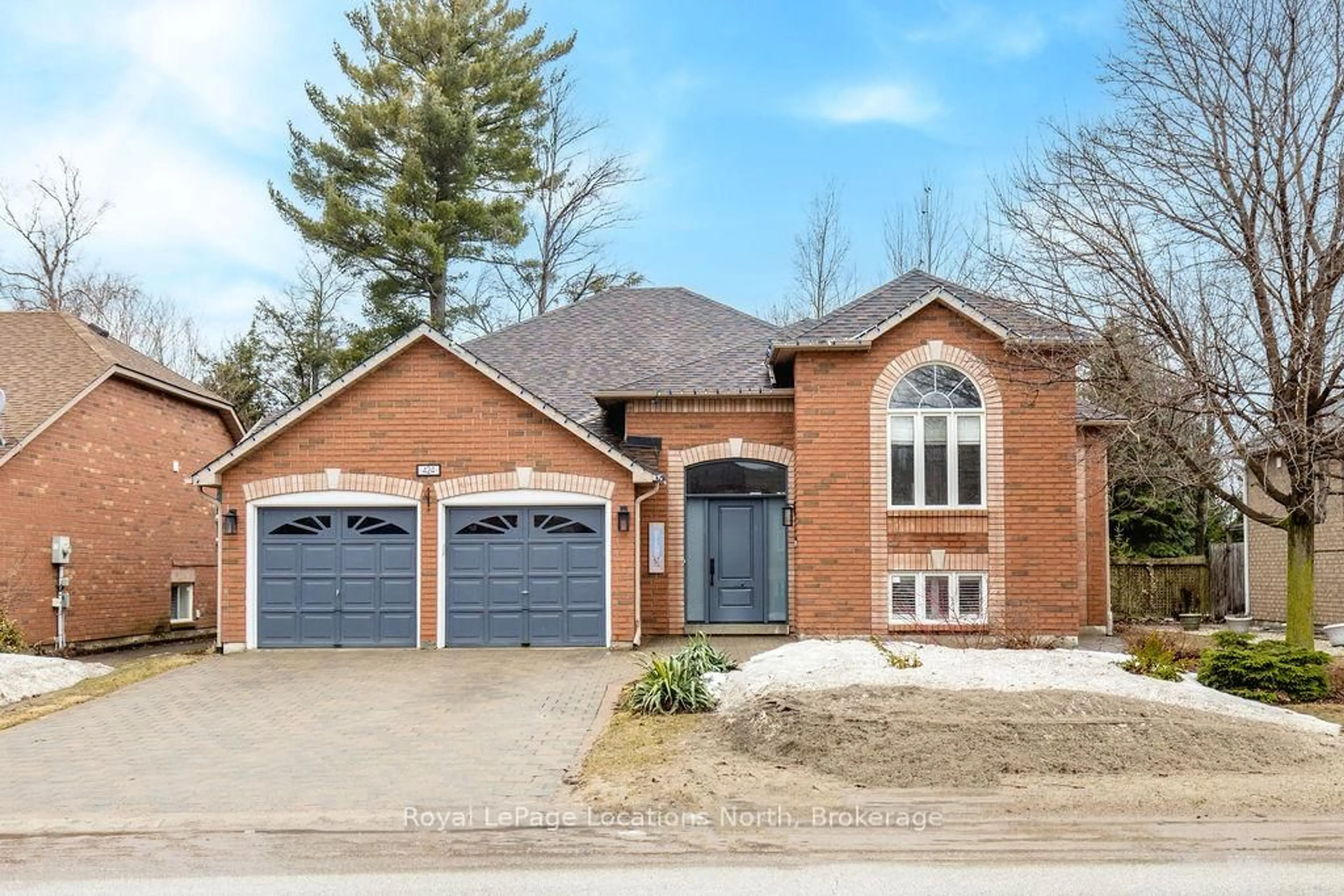 Home with brick exterior material, street for 424 Ramblewood Dr, Wasaga Beach Ontario L9Z 1P3