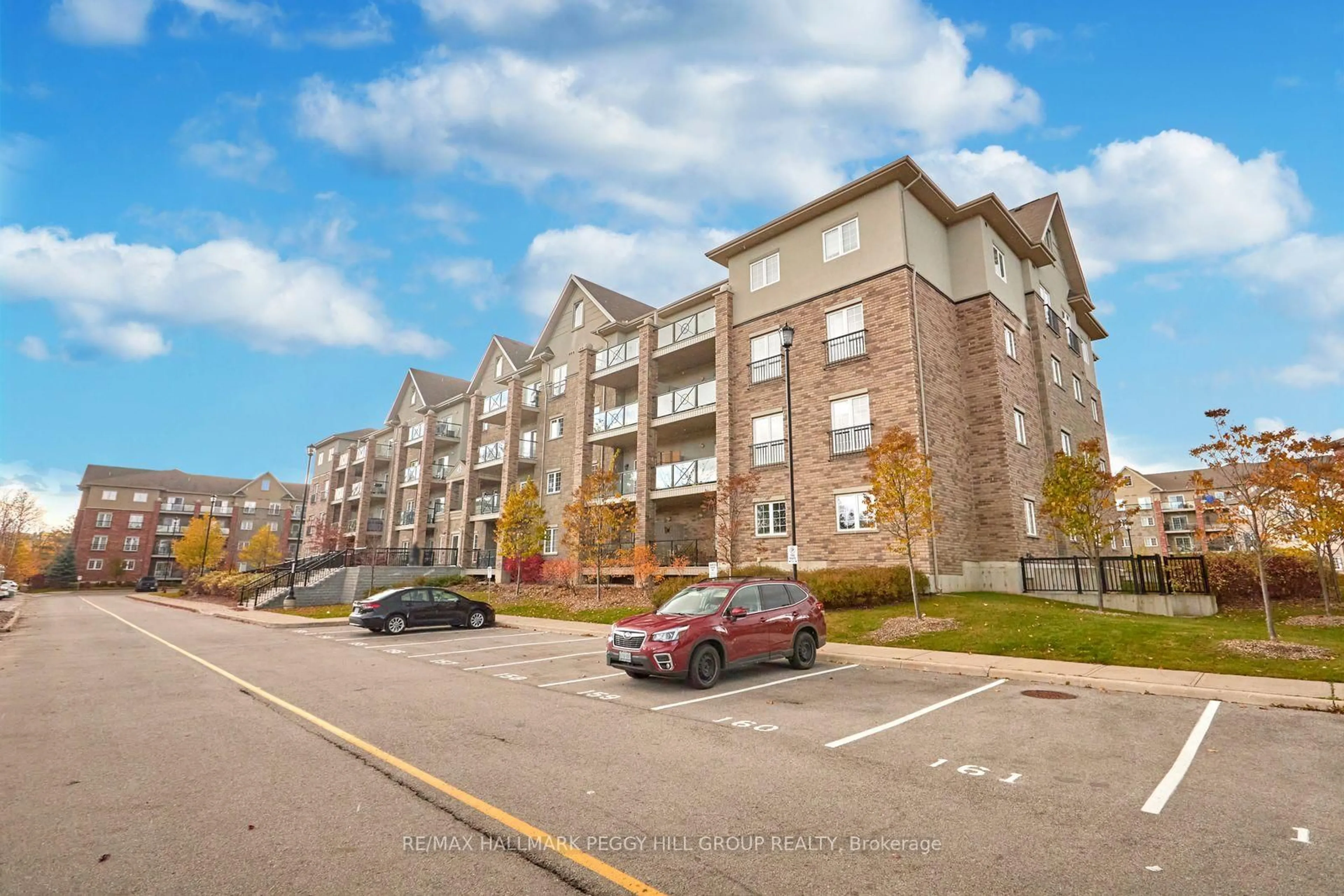 A pic from outside/outdoor area/front of a property/back of a property/a pic from drone, street for 45 Ferndale Dr #405, Barrie Ontario L4N 5W7