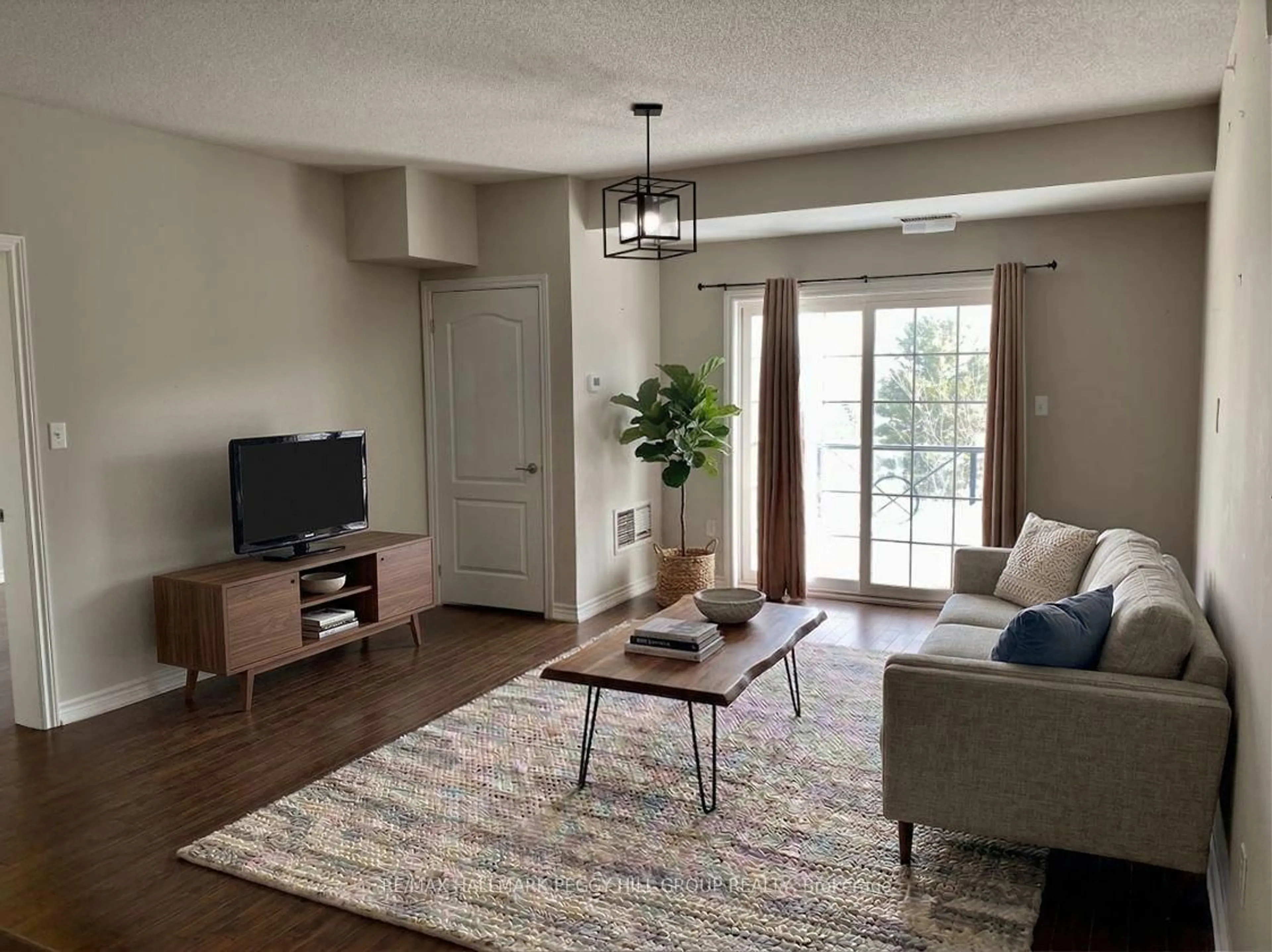 Living room with furniture, unknown for 45 Ferndale Dr #405, Barrie Ontario L4N 5W7