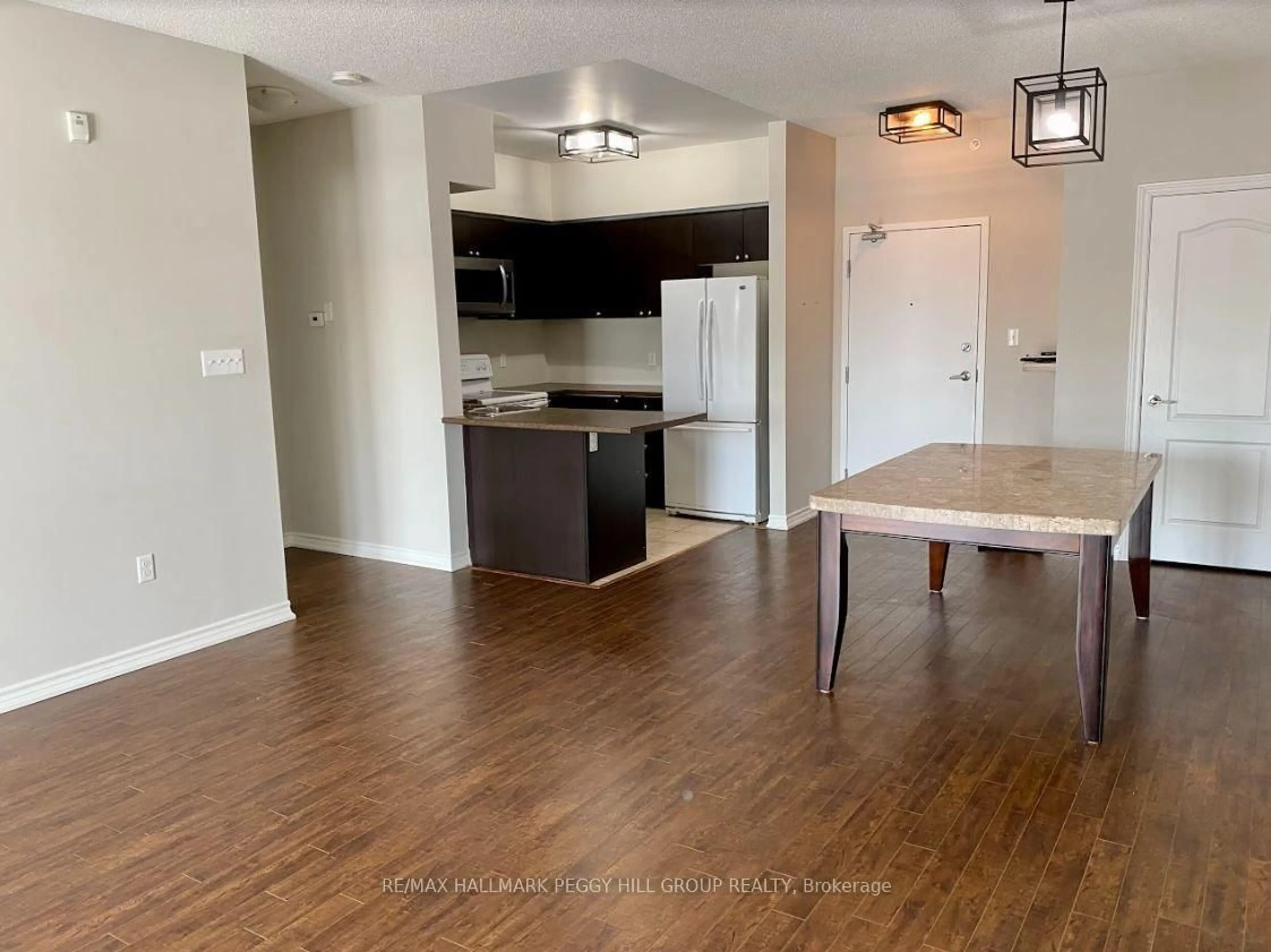 Open concept kitchen, wood/laminate floor for 45 Ferndale Dr #405, Barrie Ontario L4N 5W7