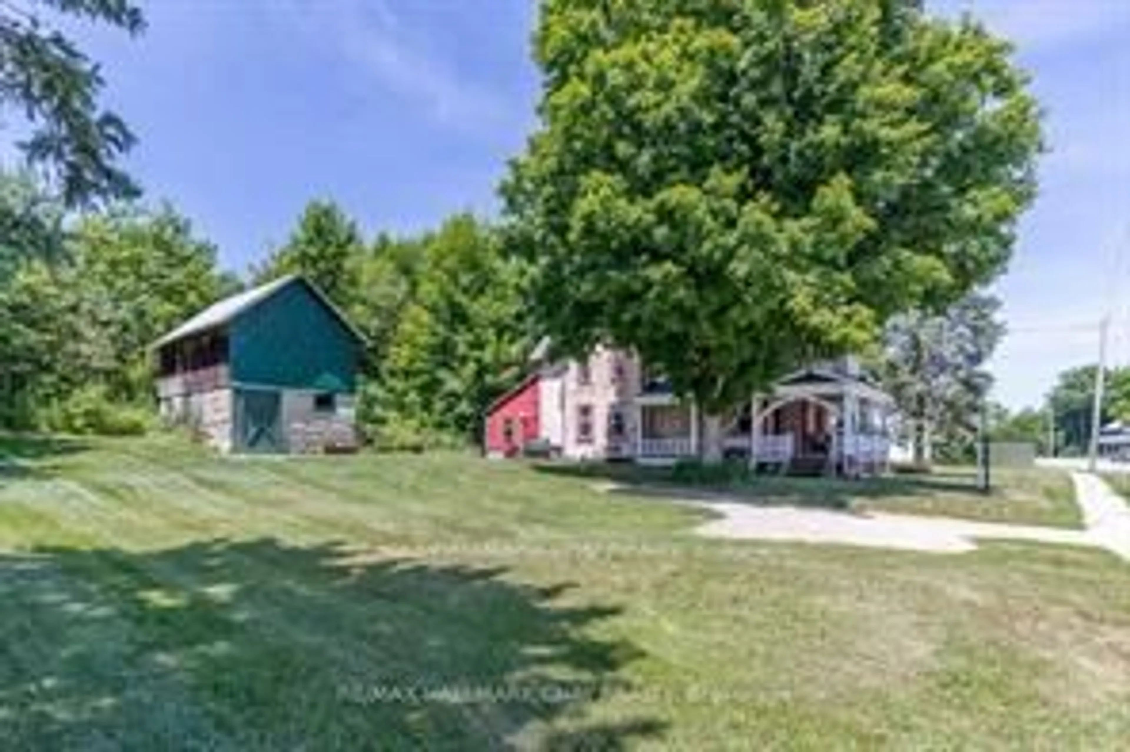 A pic from outside/outdoor area/front of a property/back of a property/a pic from drone, street for 4514 Penetanguishene Rd, Springwater Ontario L0L 1V0