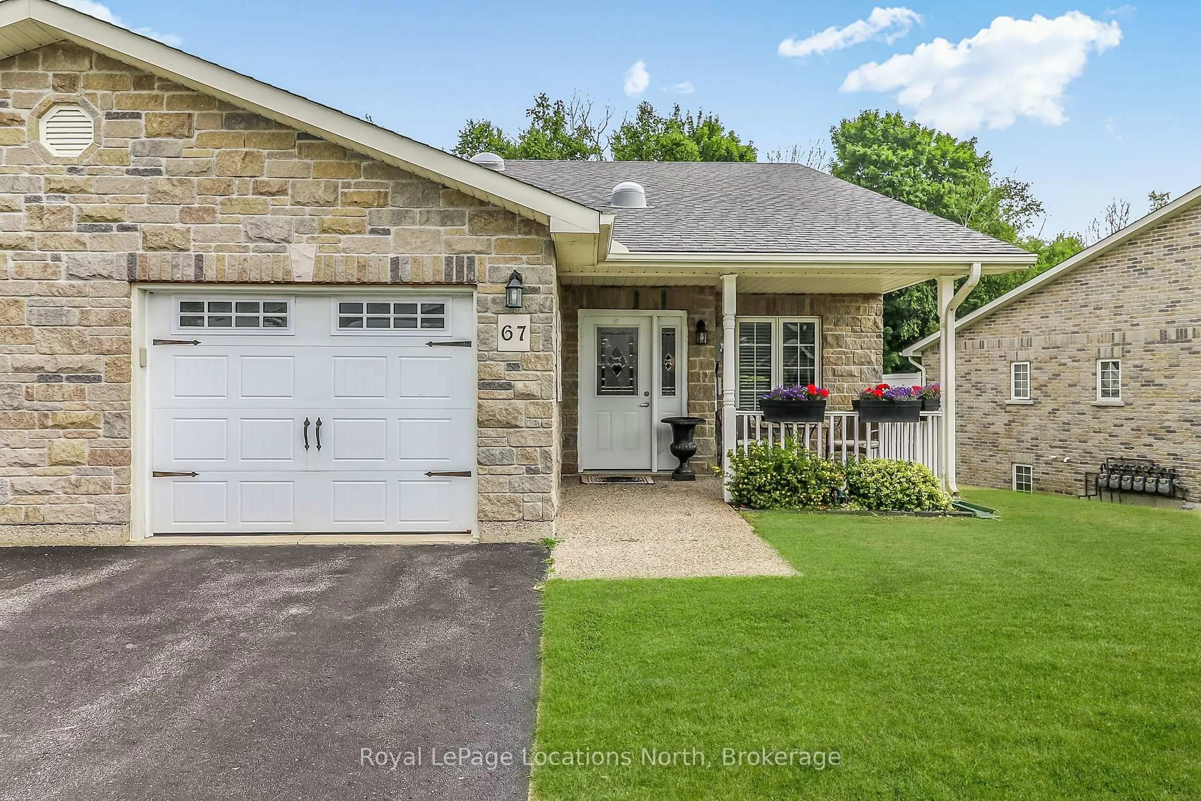 Home with brick exterior material, street for 67 Greenway Dr, Wasaga Beach Ontario L9Z 0E6