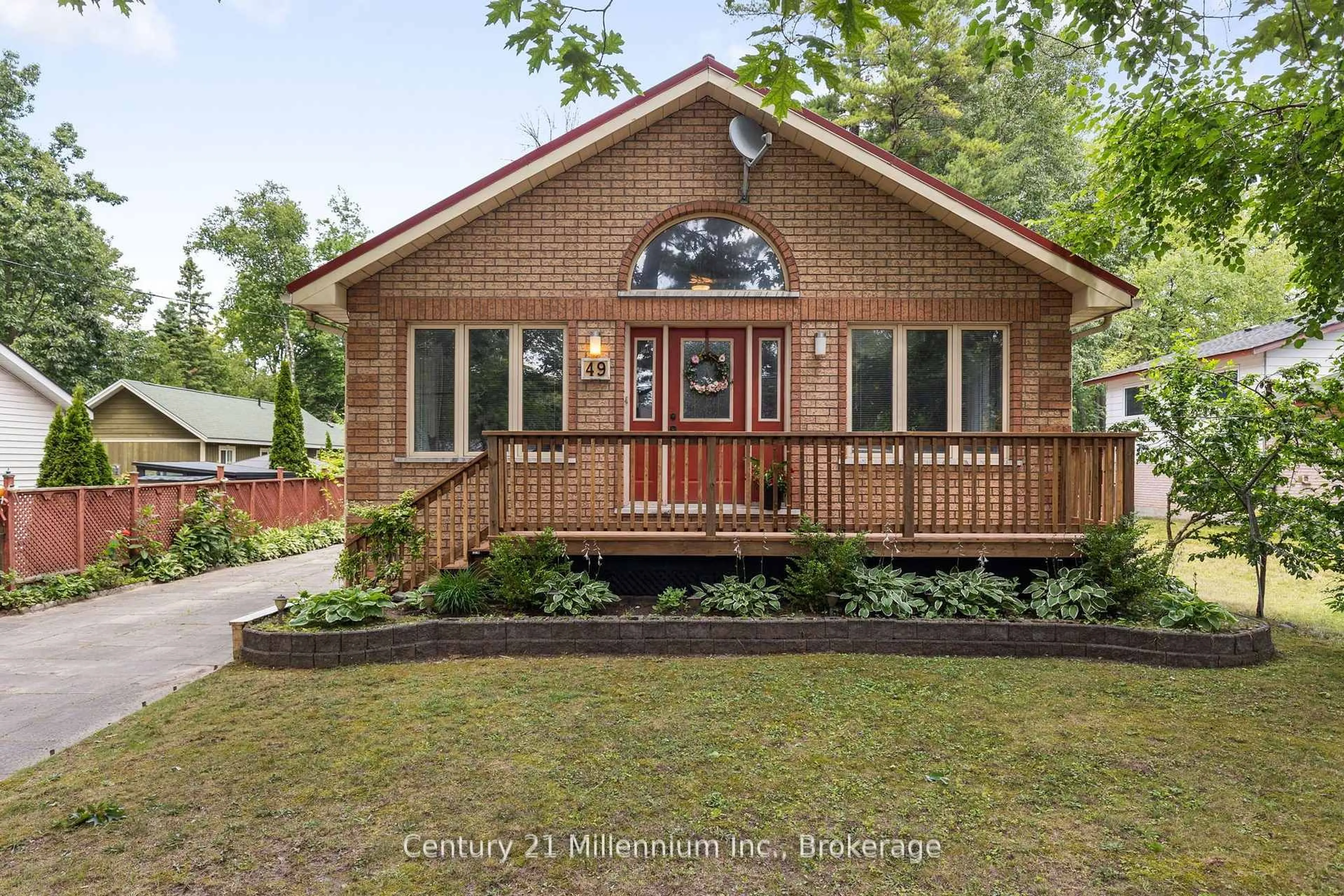 Home with brick exterior material, street for 49 32nd St, Wasaga Beach Ontario L9Z 2C4