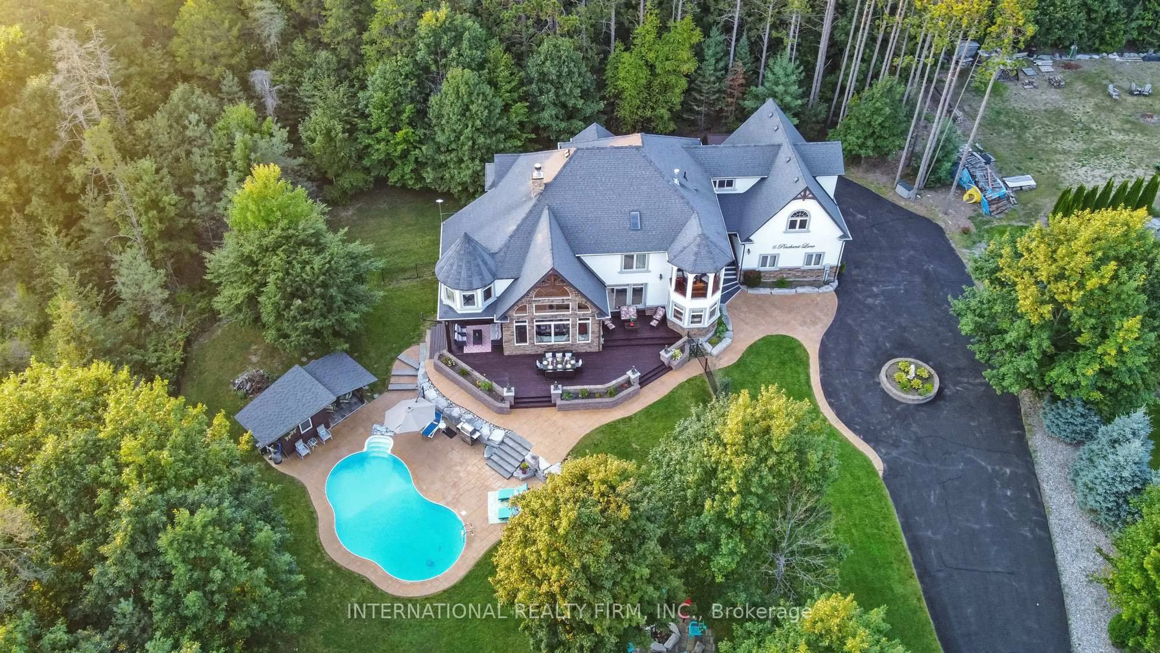 A pic from outside/outdoor area/front of a property/back of a property/a pic from drone, water/lake/river/ocean view for 6 Pinehurst Lane, Springwater Ontario L9X 0C7