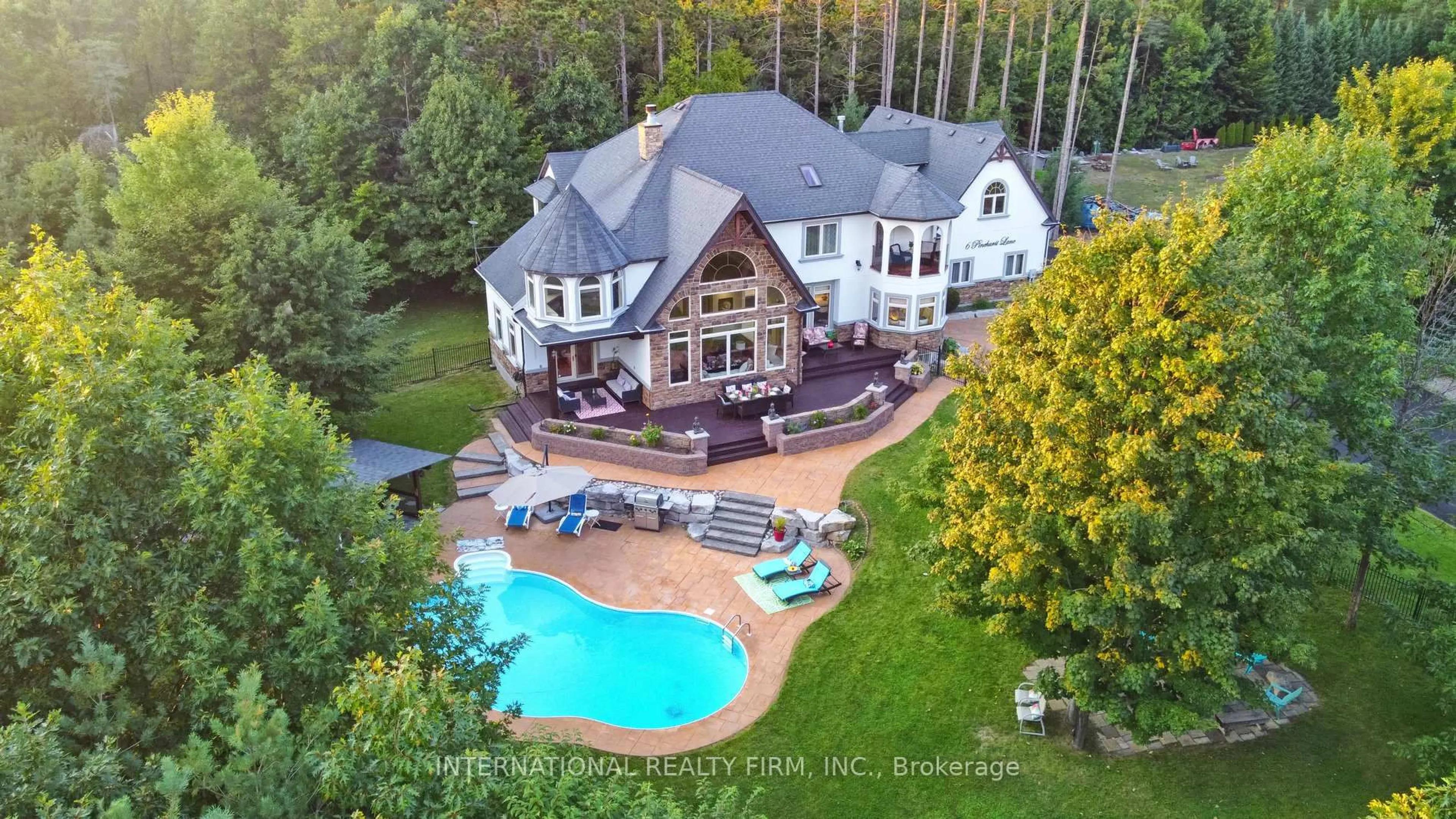A pic from outside/outdoor area/front of a property/back of a property/a pic from drone, water/lake/river/ocean view for 6 Pinehurst Lane, Springwater Ontario L9X 0C7